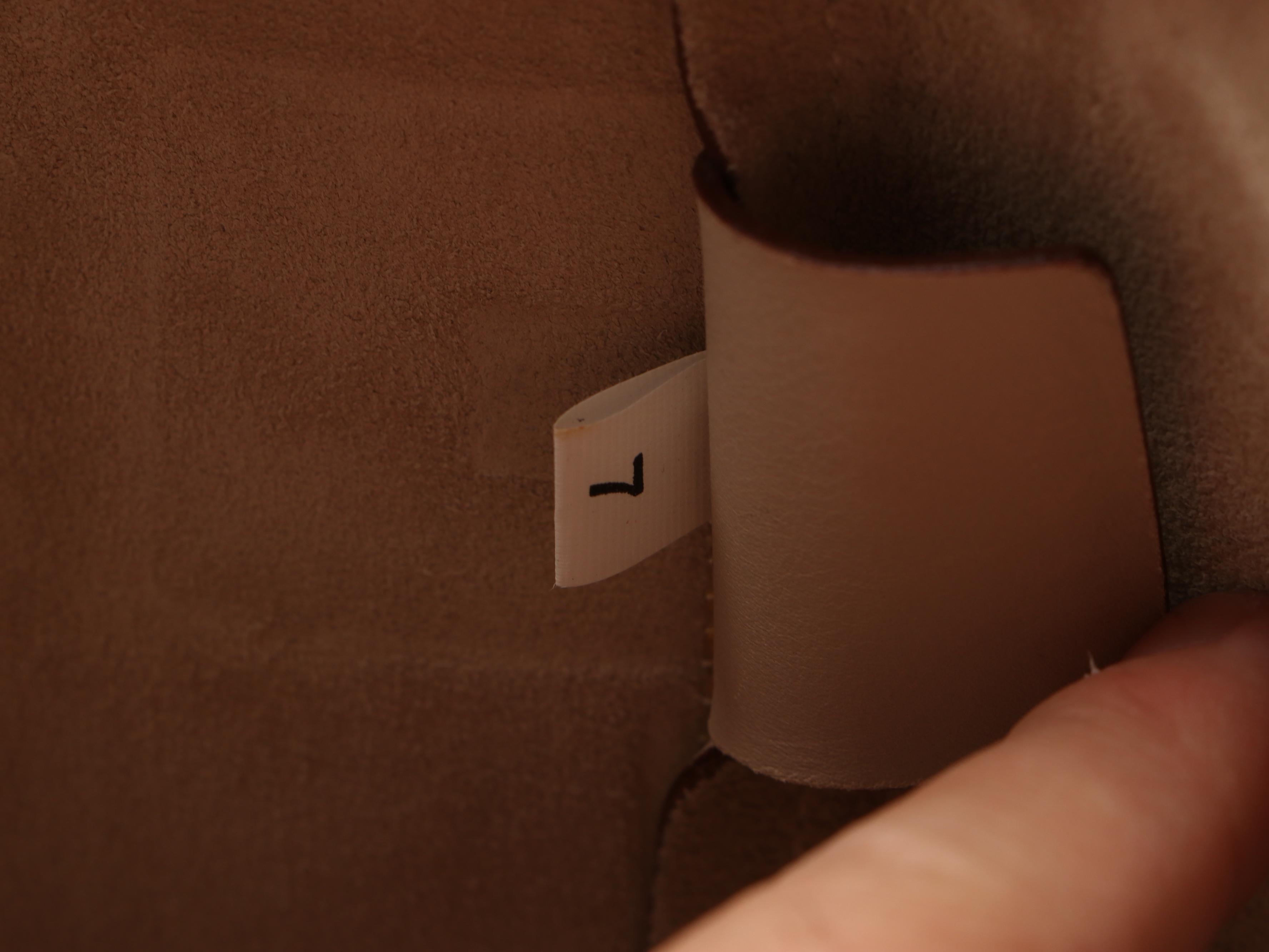 Prada Tote in Leather with Metal Circle Accents