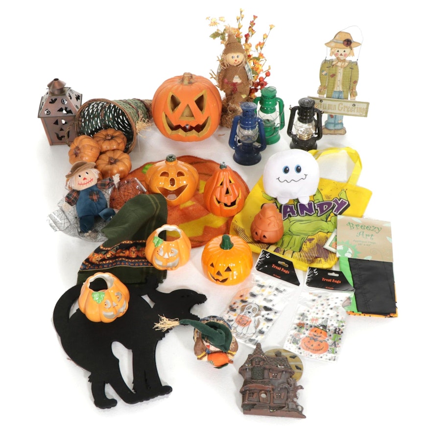 Halloween Decorations Feat. Pumpkin Candles, Illuminated Jack-O-Lantern, & More