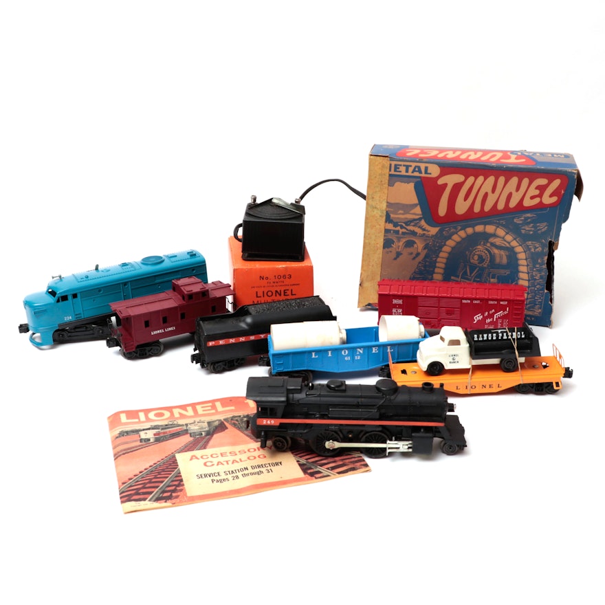 Lionel and Other Train Pieces Including Louis Marx and Co. Metal Tunnel