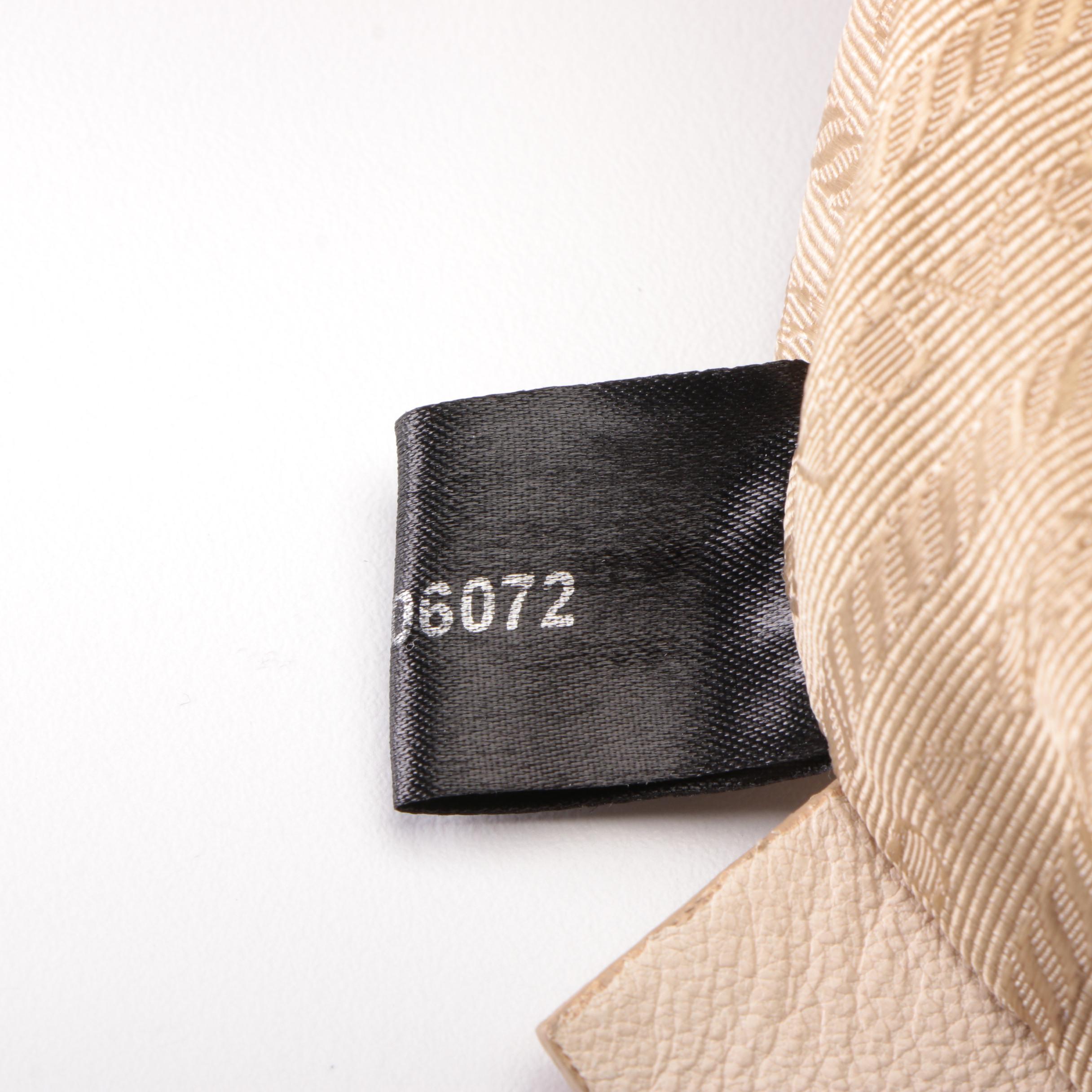 Prada Two-Way Hobo Bag in Off-White Leather with Snakeskin Bow Detail