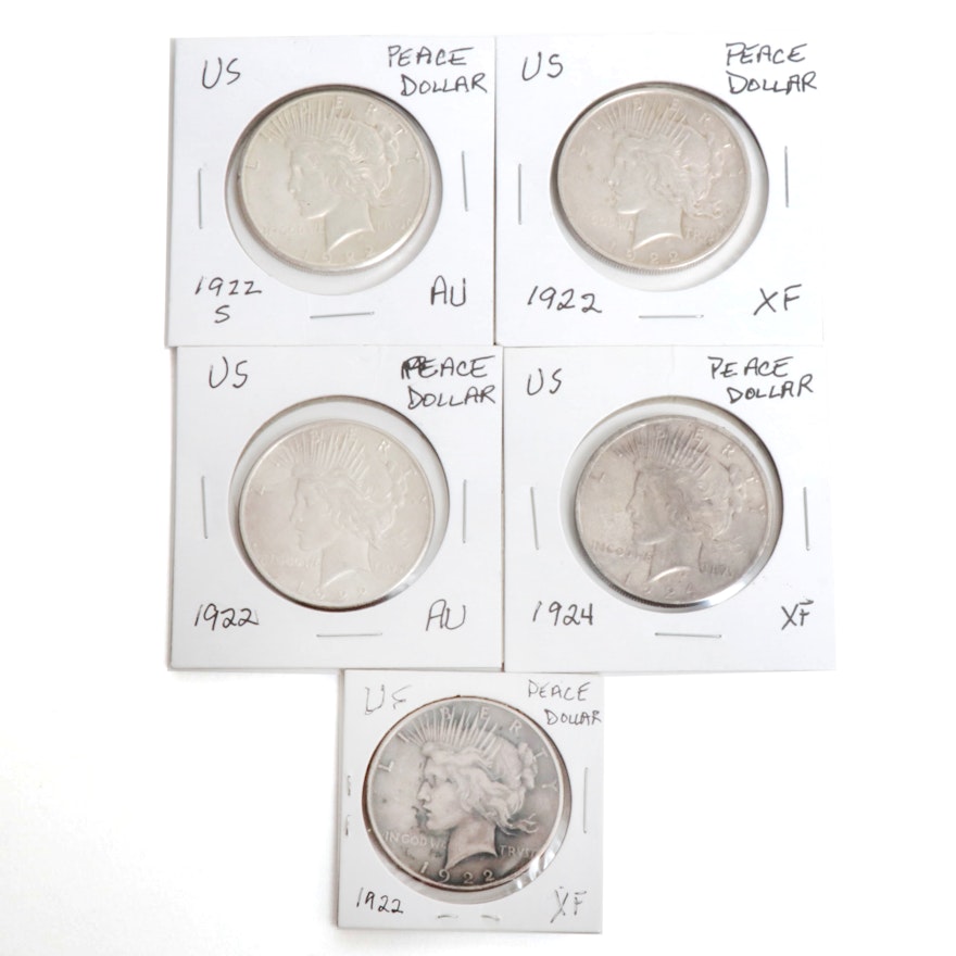 Five US Peace Silver Dollars