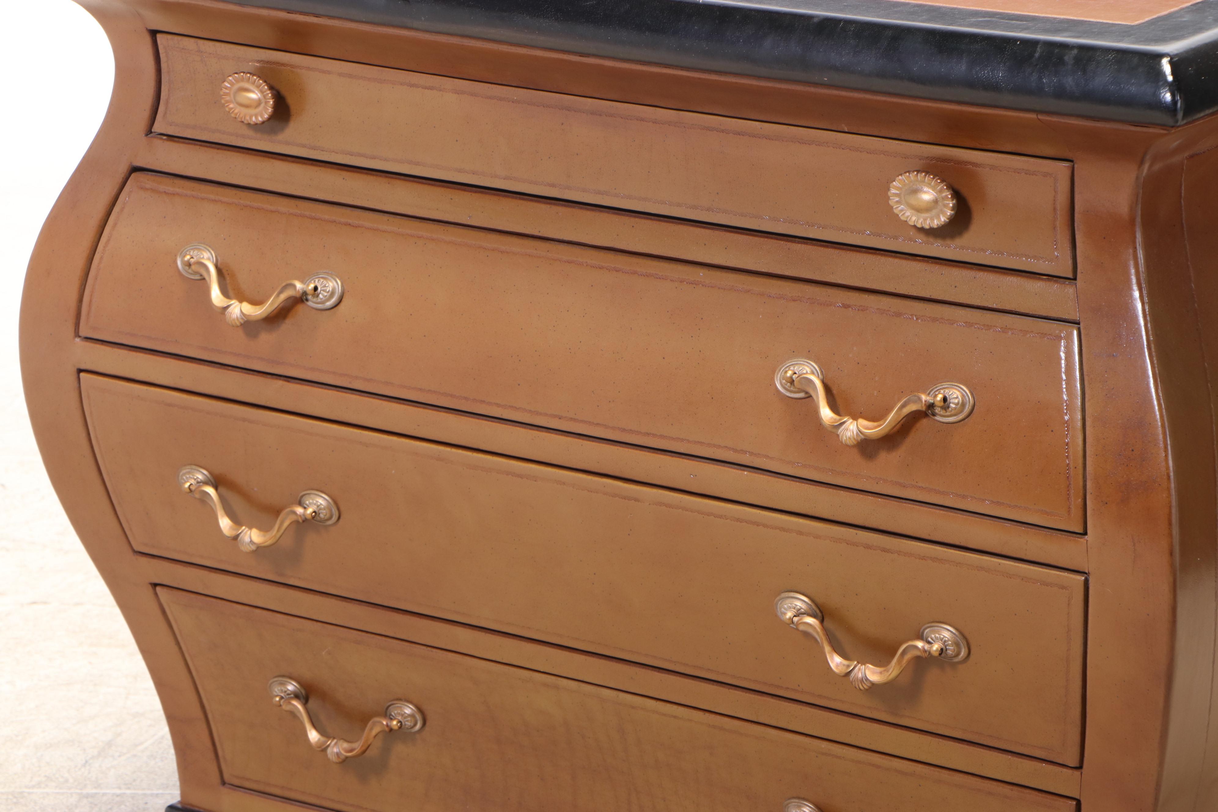 Henredon Leather-Covered and Parcel-Ebonized Bombé Chest