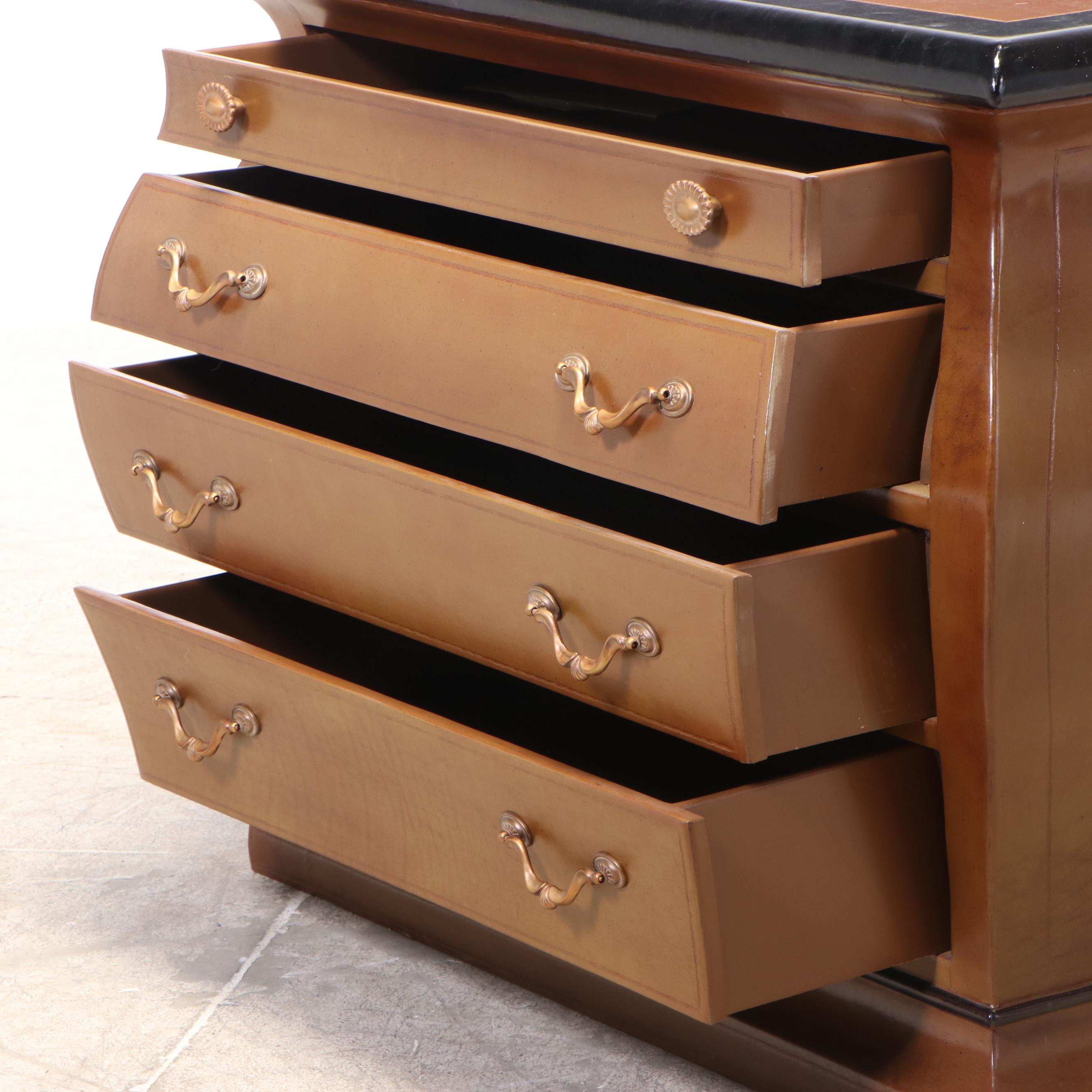 Henredon Leather-Covered and Parcel-Ebonized Bombé Chest