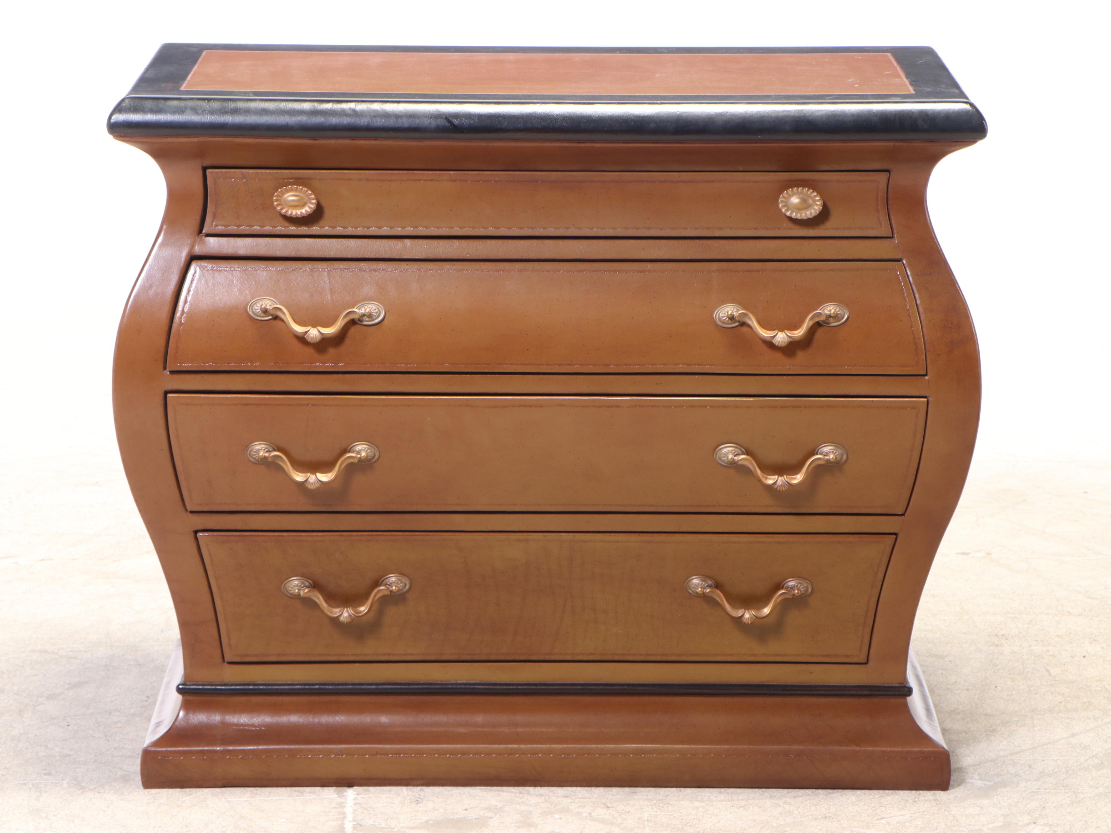 Henredon Leather-Covered and Parcel-Ebonized Bombé Chest