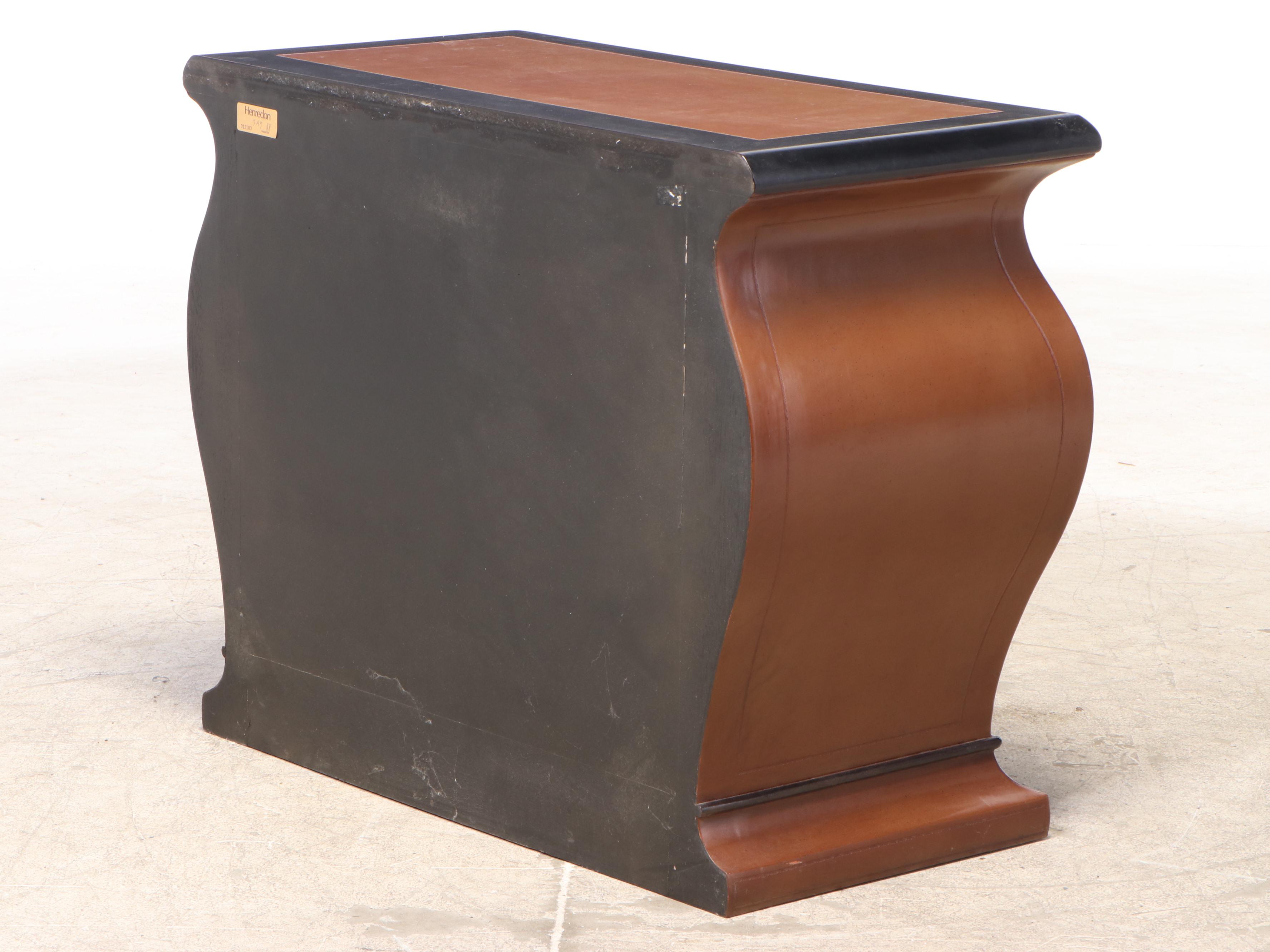 Henredon Leather-Covered and Parcel-Ebonized Bombé Chest