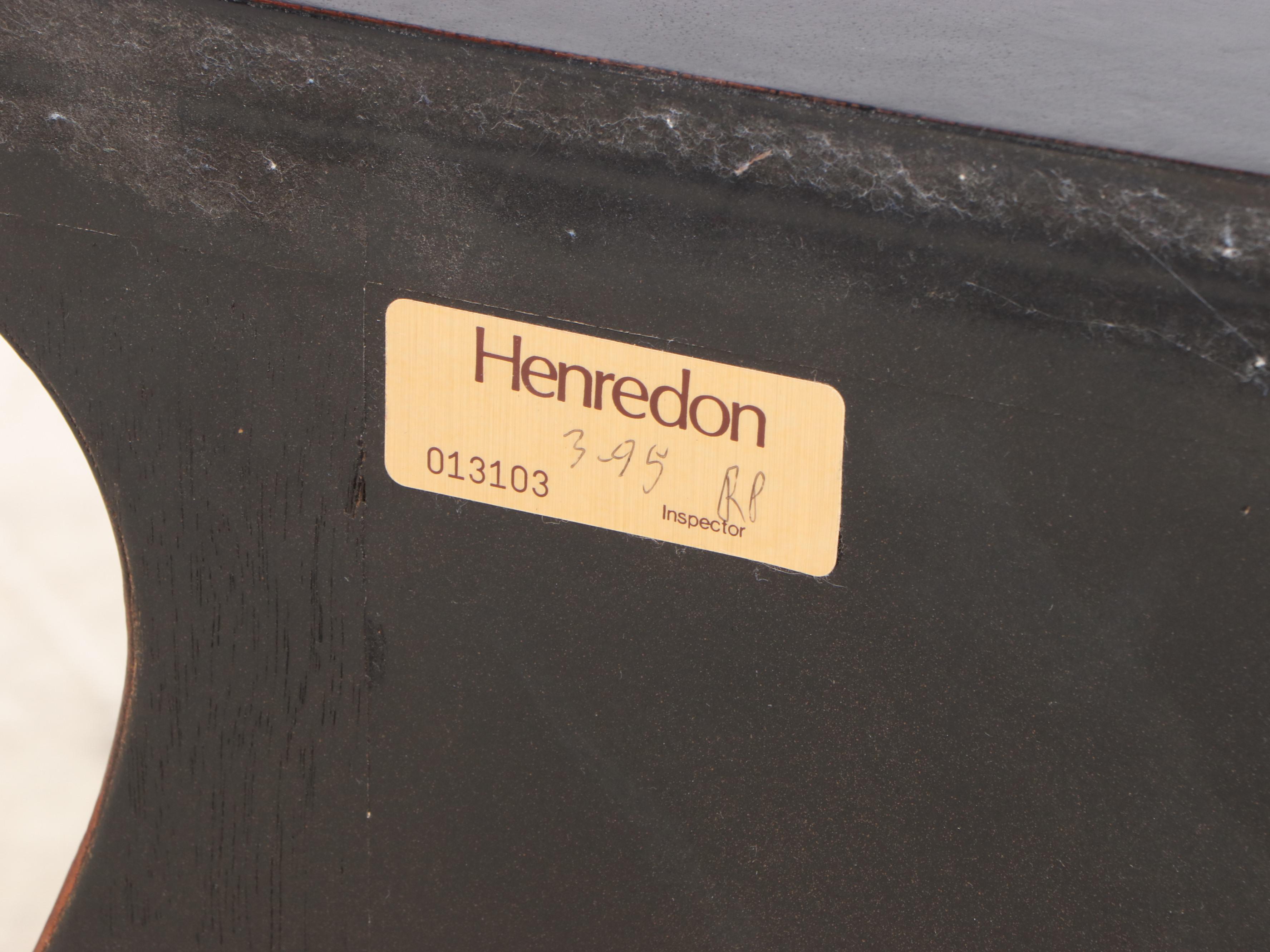 Henredon Leather-Covered and Parcel-Ebonized Bombé Chest