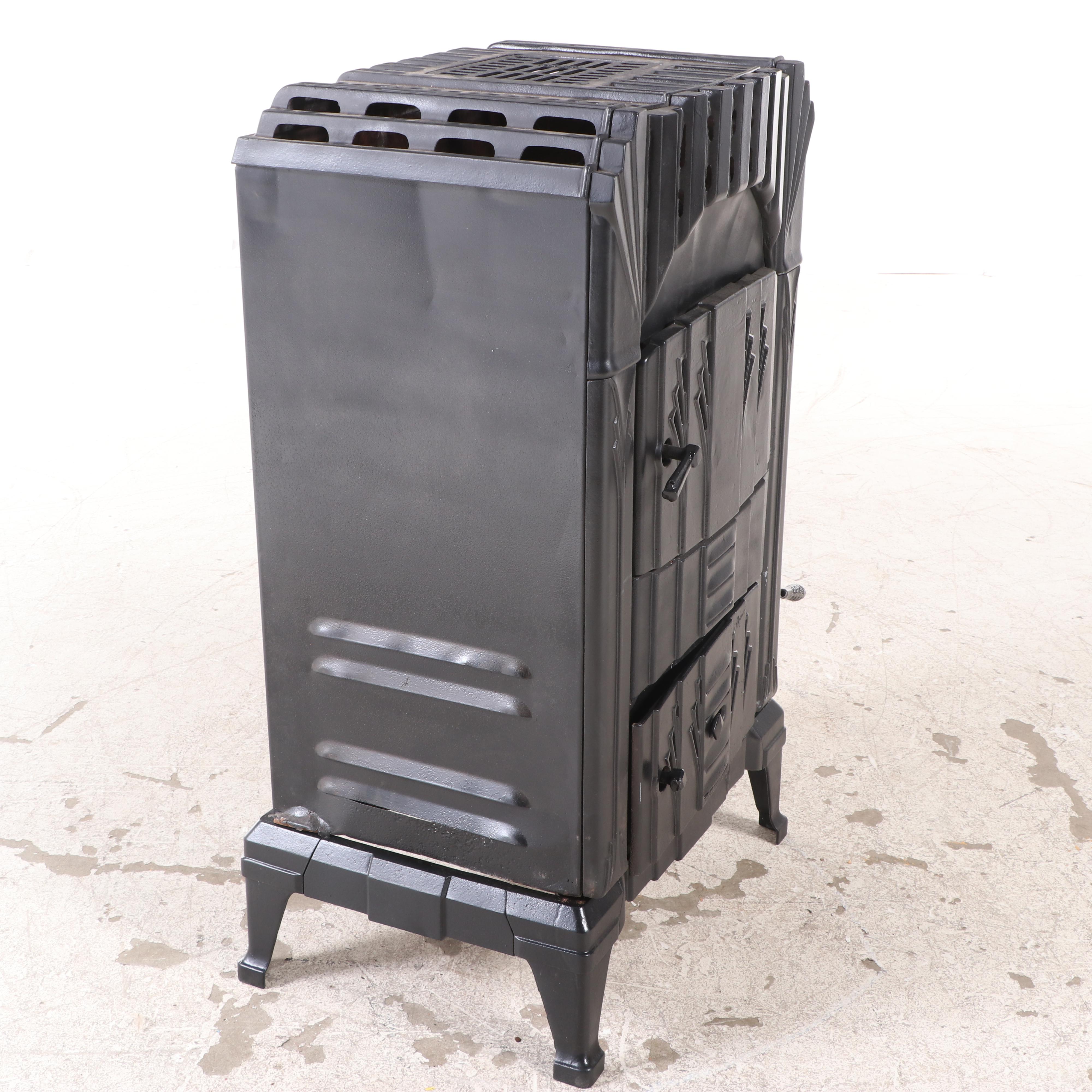 Spiegel Inc. "Fireside Sunburst" Art Deco Cast Iron Wood Stove, Early 20th C.