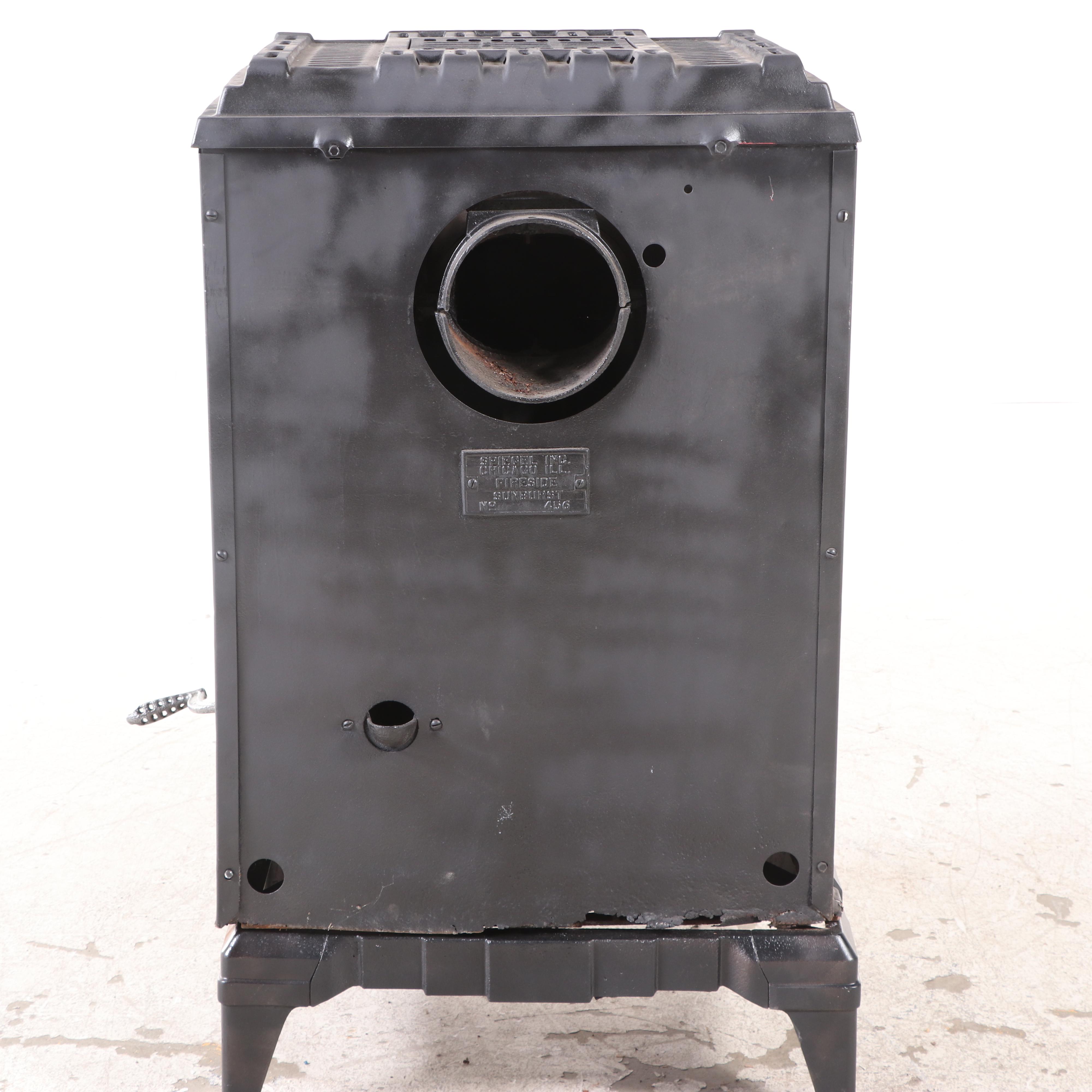 Spiegel Inc. "Fireside Sunburst" Art Deco Cast Iron Wood Stove, Early 20th C.