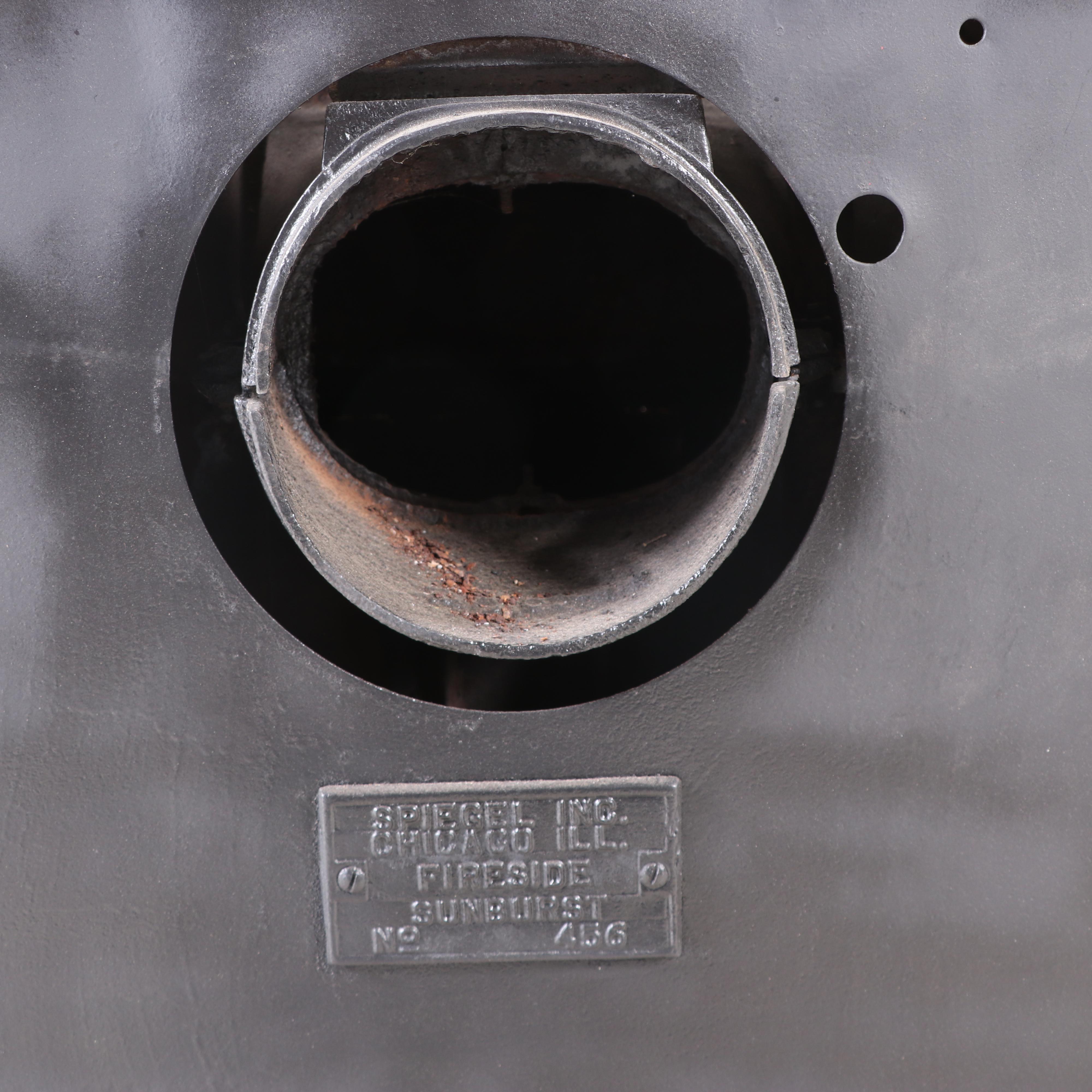 Spiegel Inc. "Fireside Sunburst" Art Deco Cast Iron Wood Stove, Early 20th C.