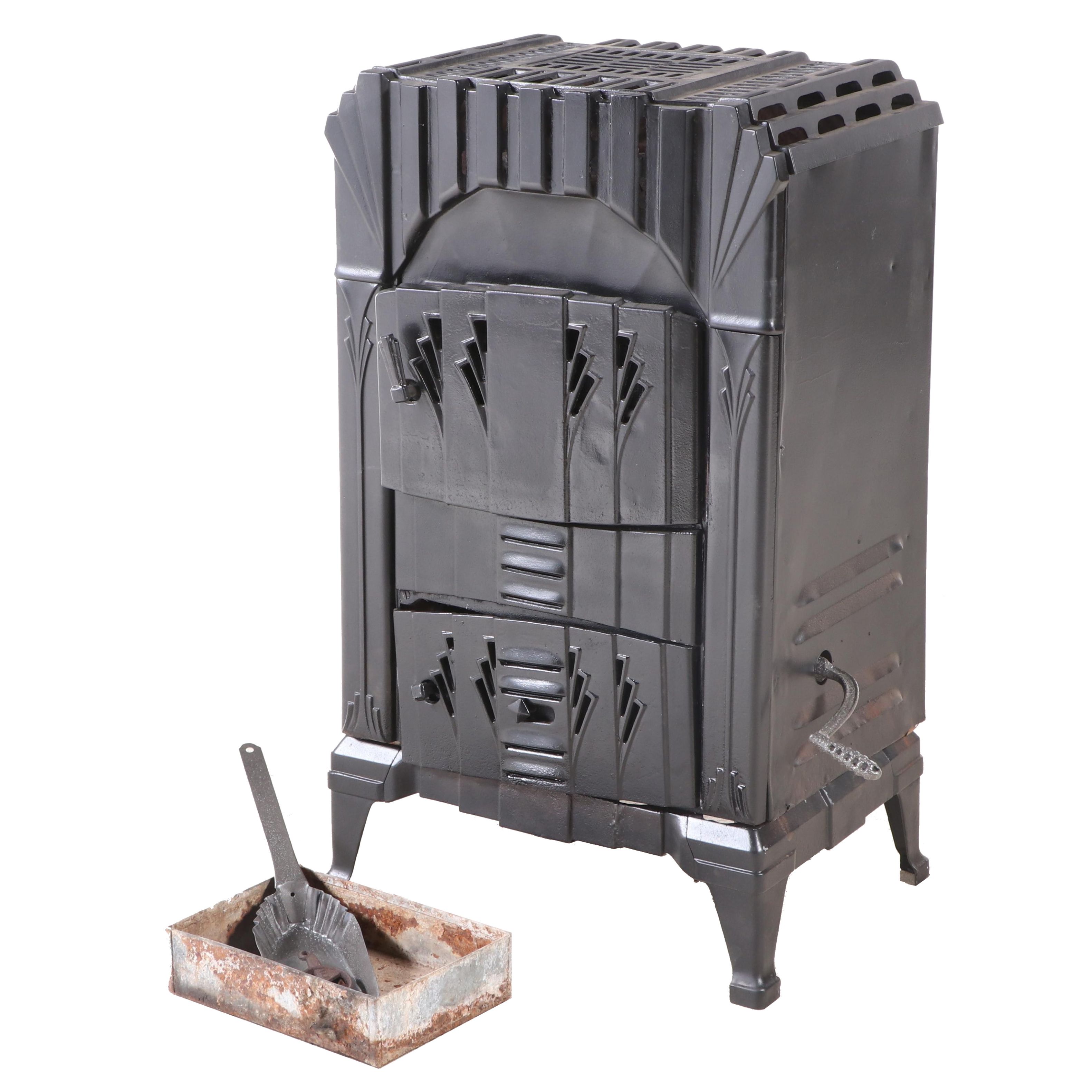 Spiegel Inc. "Fireside Sunburst" Art Deco Cast Iron Wood Stove, Early 20th C.