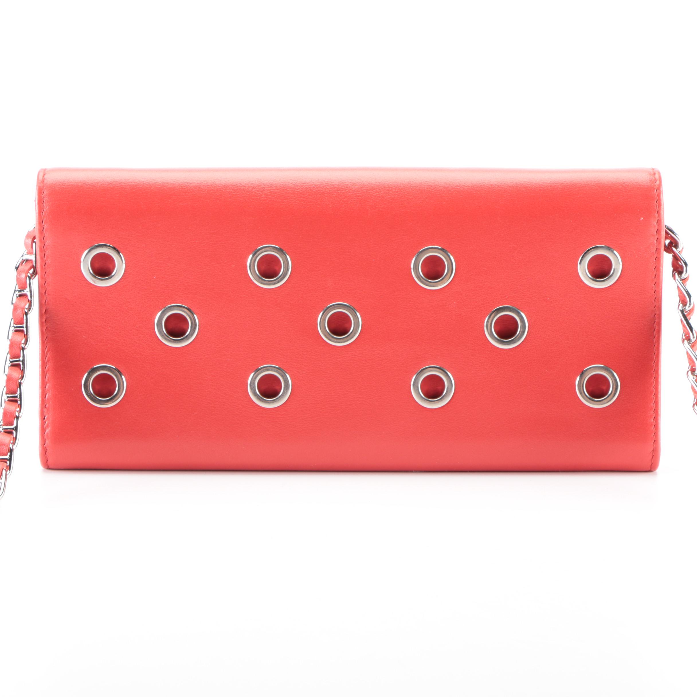 Prada Wallet on Chain Clutch in Grommet Embellished Red Leather