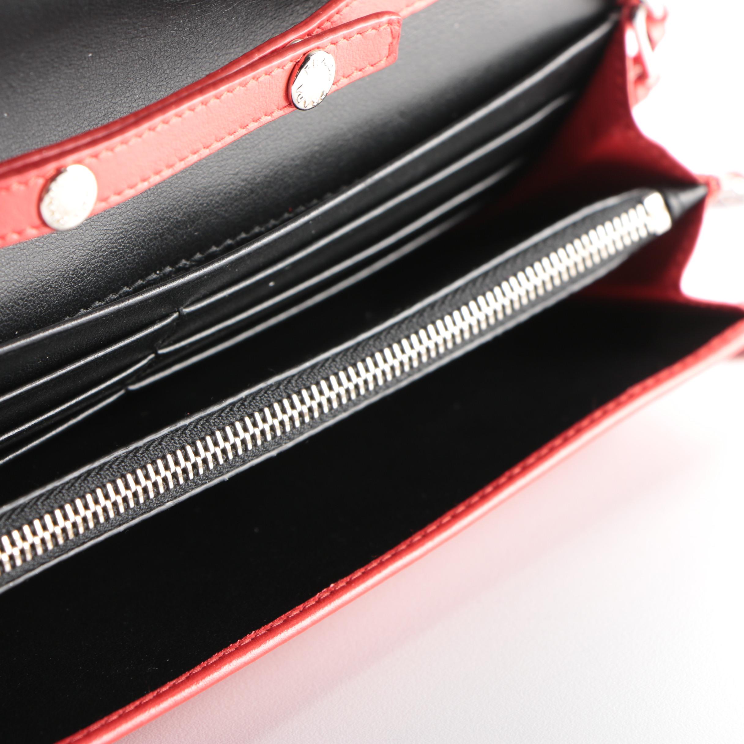 Prada Wallet on Chain Clutch in Grommet Embellished Red Leather