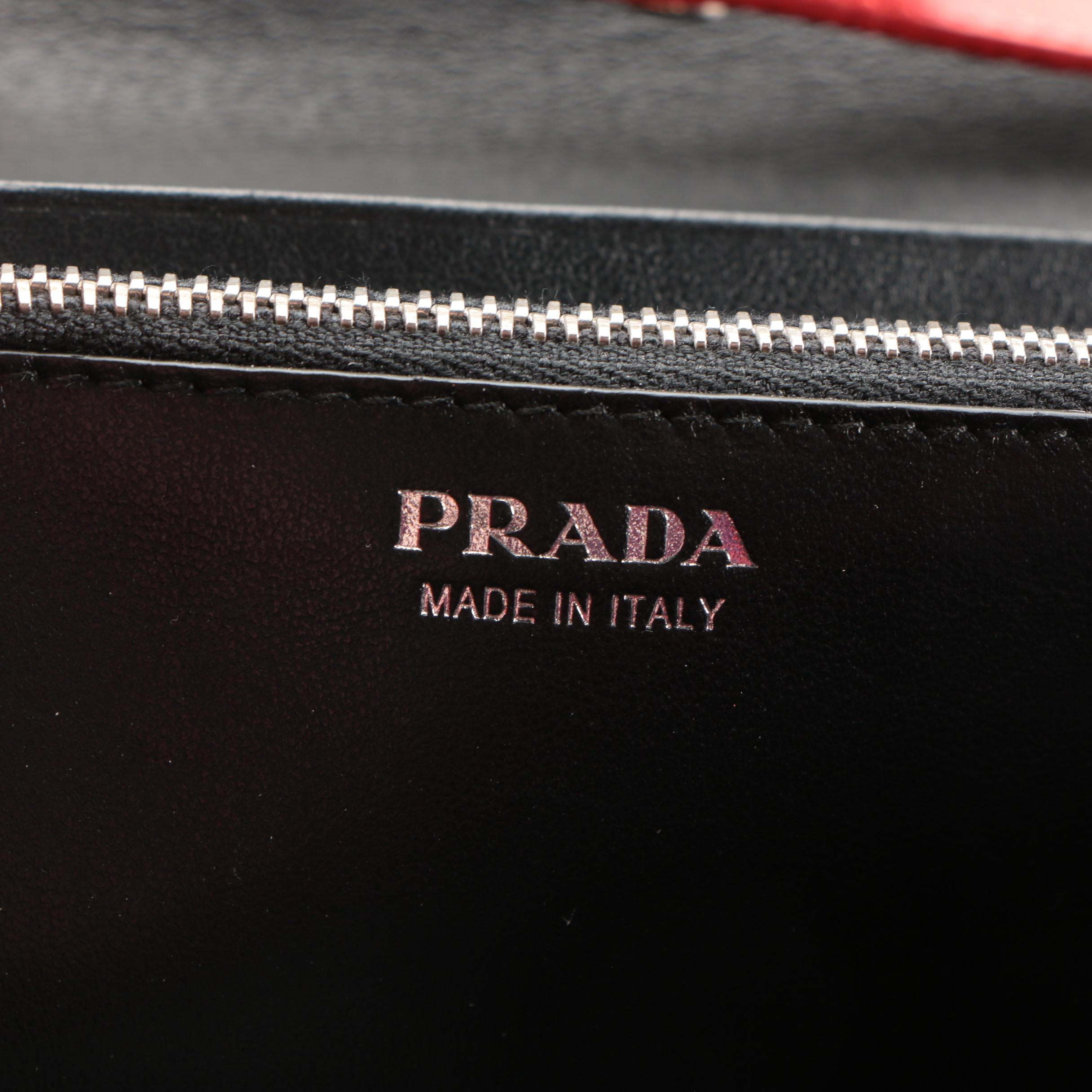 Prada Wallet on Chain Clutch in Grommet Embellished Red Leather