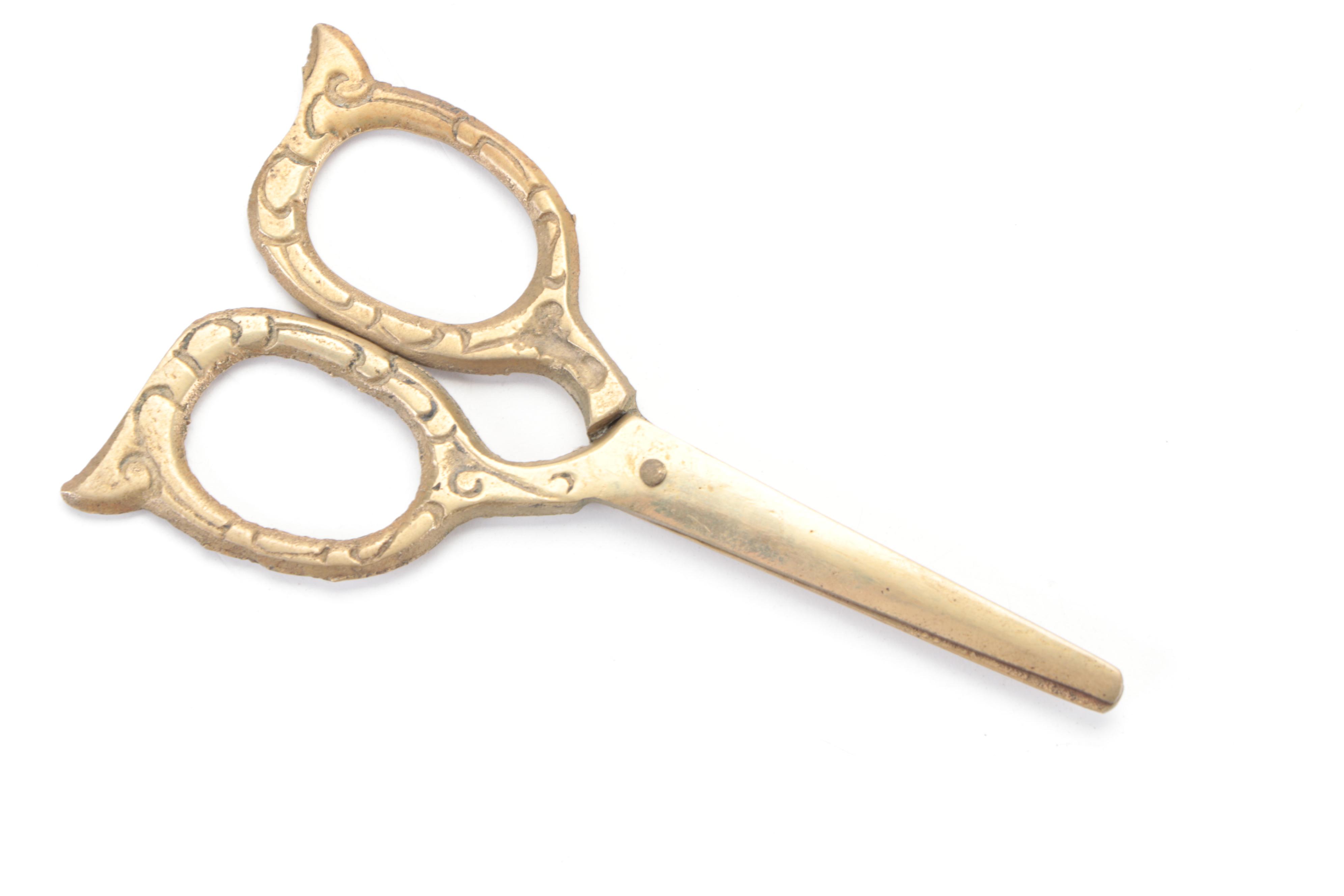 Victorian Style Brass Expandable Bookend, Butterfly Pincushion, and Candlesticks