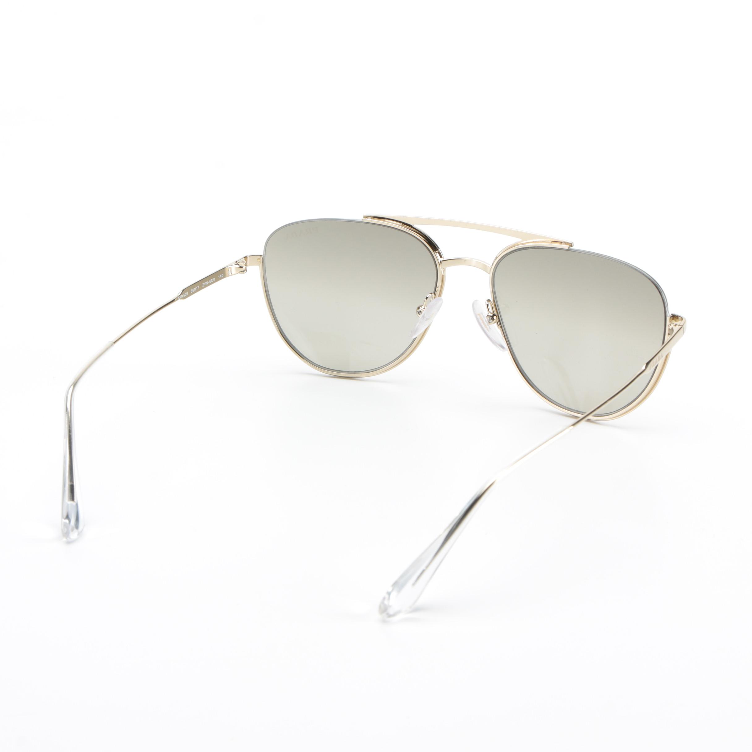 Prada SPR50U Aviator Sunglasses in Gold Tone with Light Brown Gradient Lenses