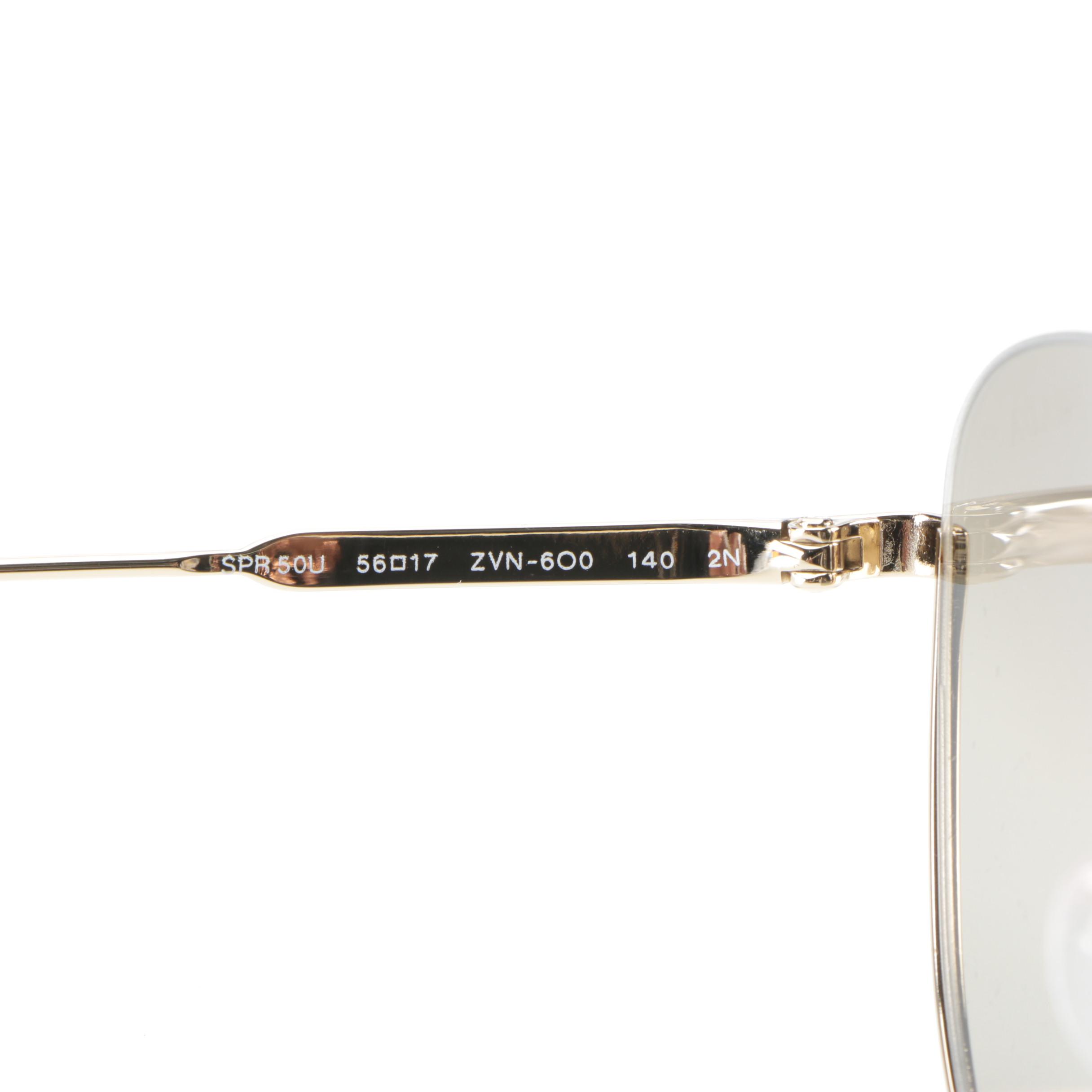 Prada SPR50U Aviator Sunglasses in Gold Tone with Light Brown Gradient Lenses