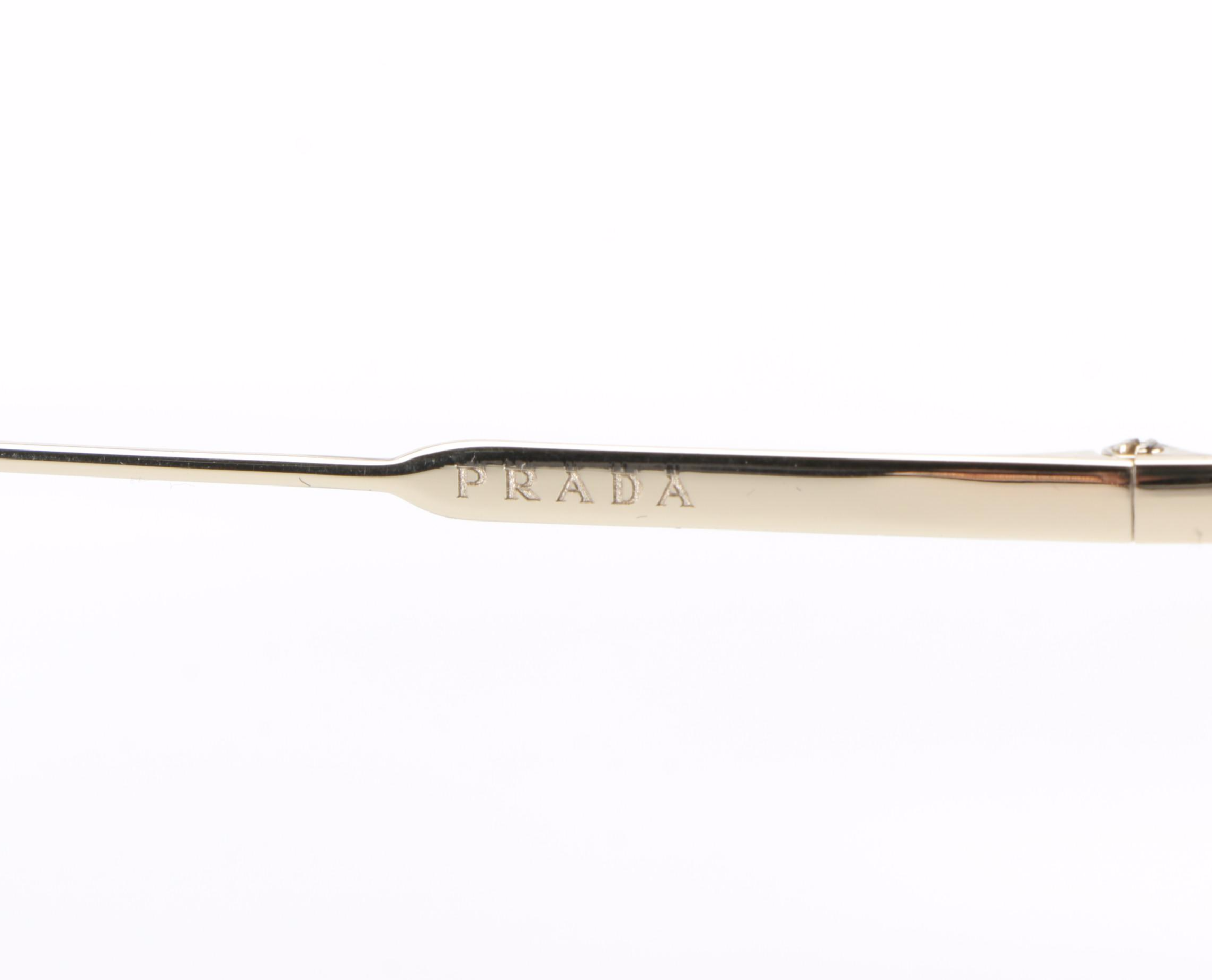 Prada SPR50U Aviator Sunglasses in Gold Tone with Light Brown Gradient Lenses