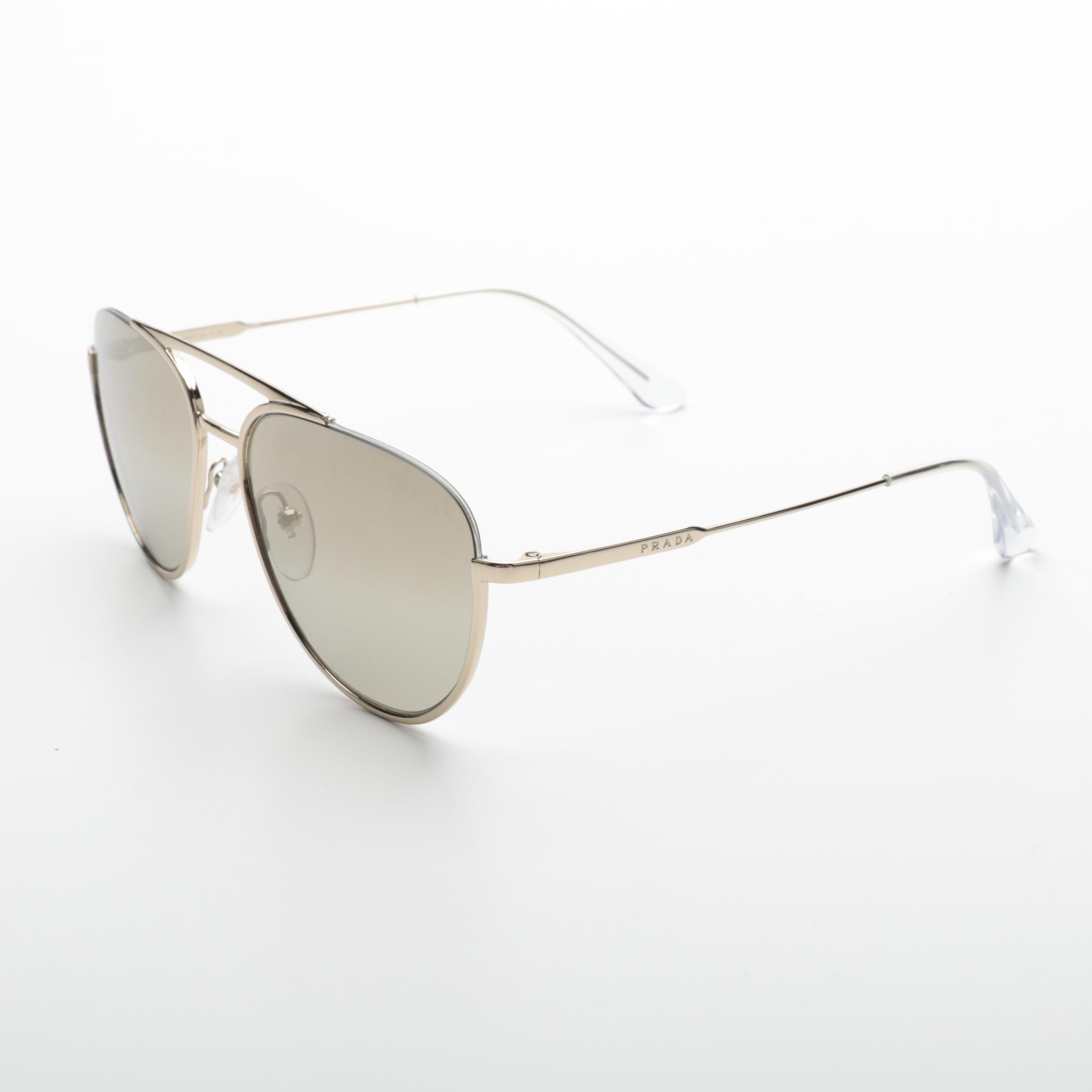 Prada SPR 50U Aviator Sunglasses in Light Gold Frame with Gradient Lenses