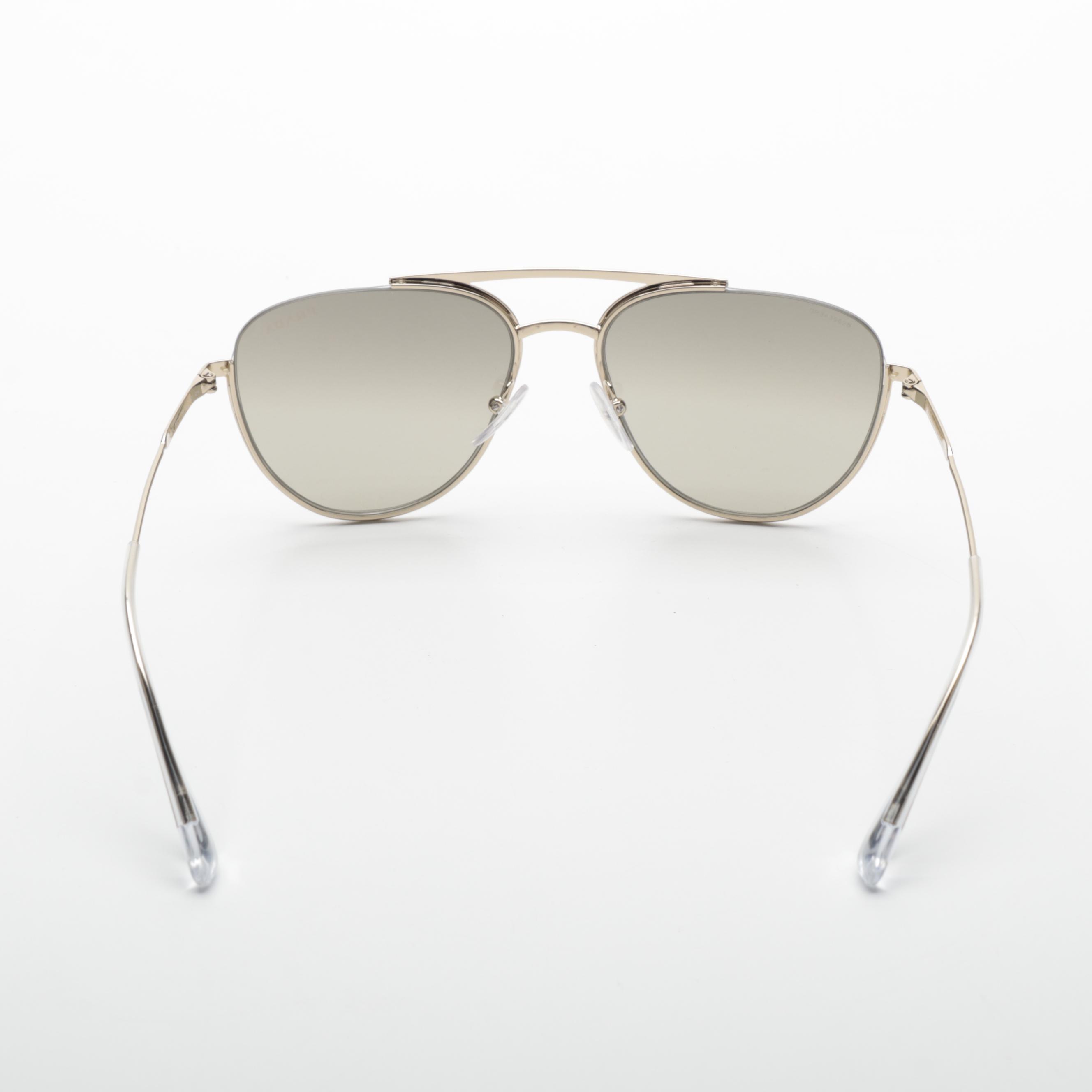 Prada SPR 50U Aviator Sunglasses in Light Gold Frame with Gradient Lenses