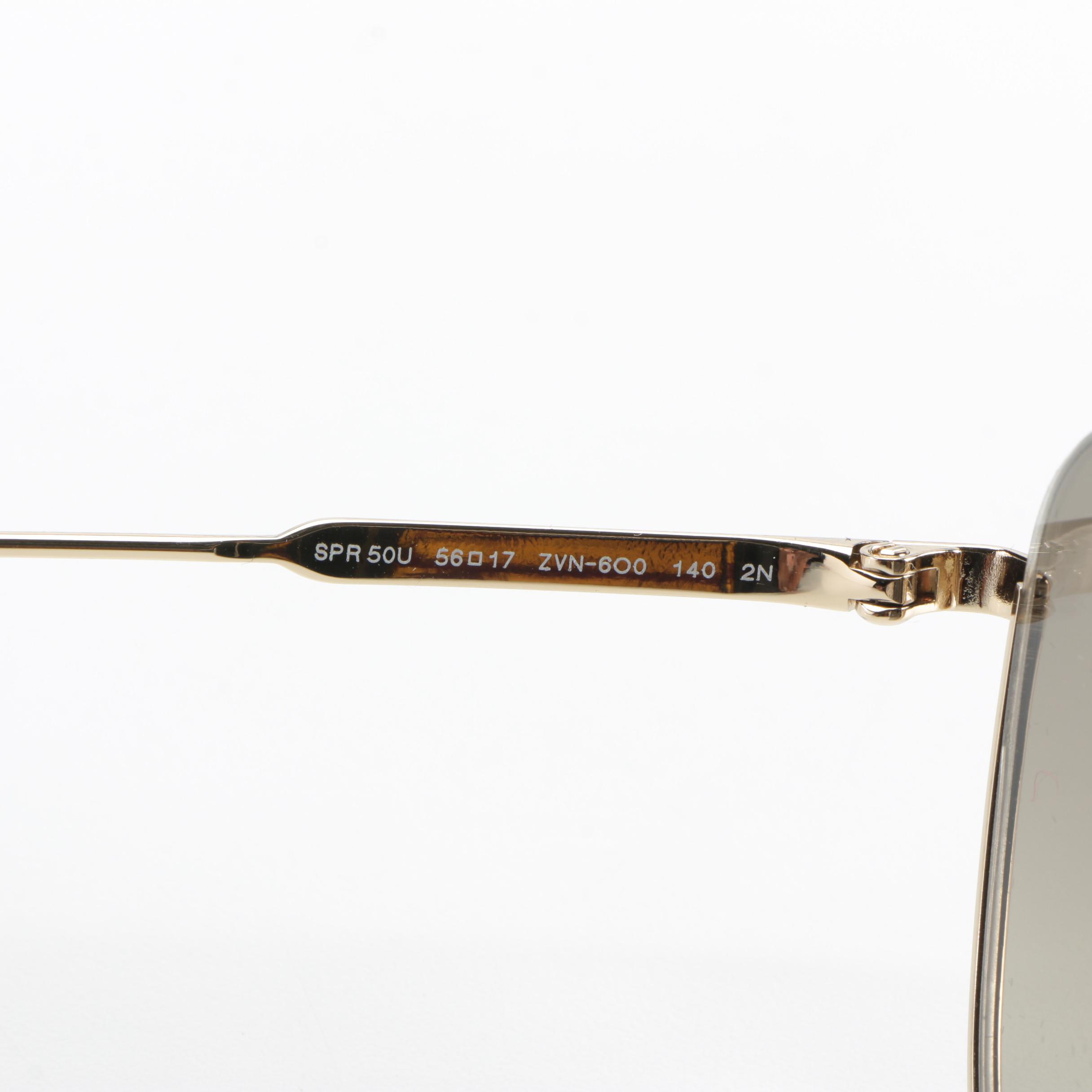 Prada SPR50U Aviator Sunglasses in Gold Metal Frame with Gradient Lenses