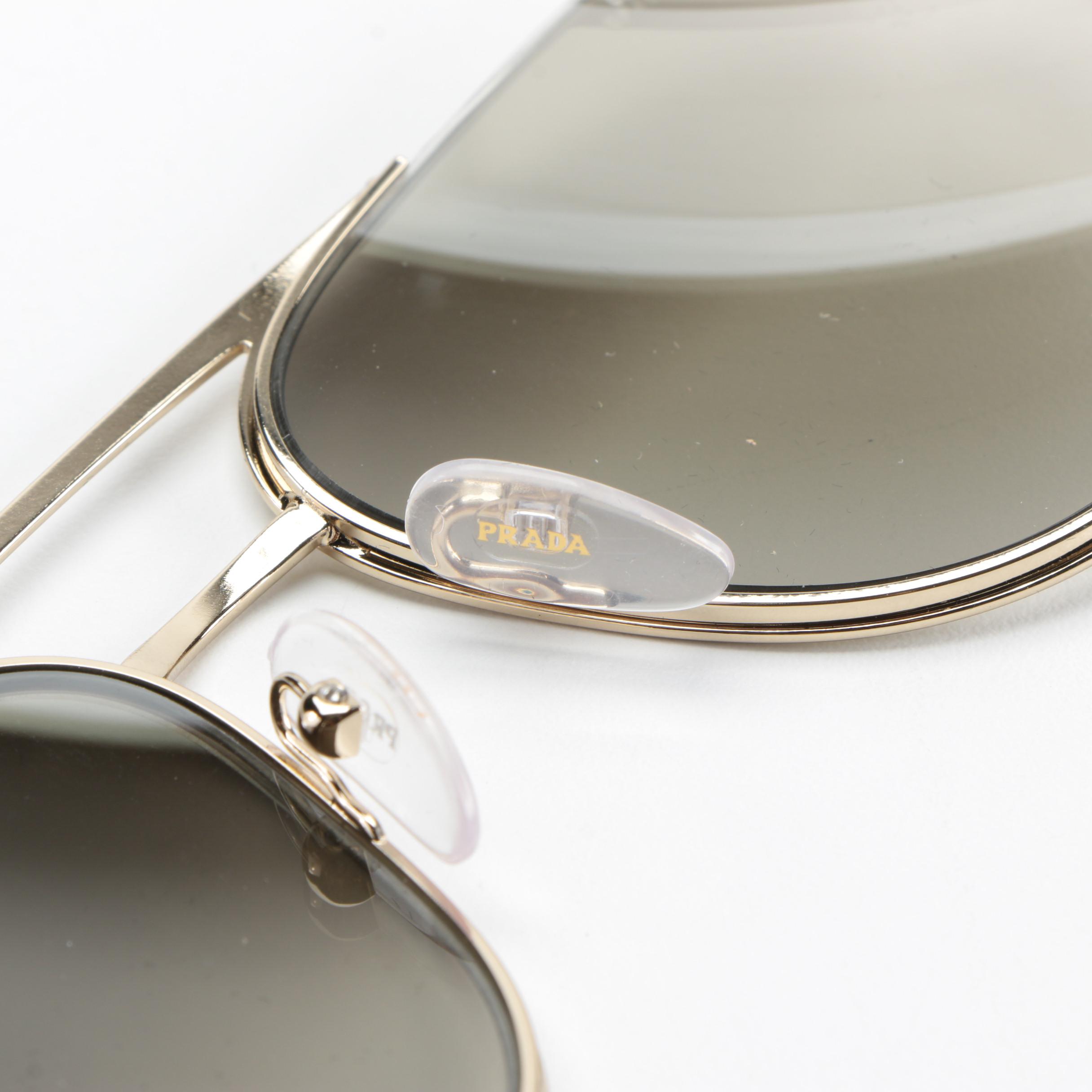 Prada SPR50U Aviator Sunglasses in Gold Metal Frame with Gradient Lenses
