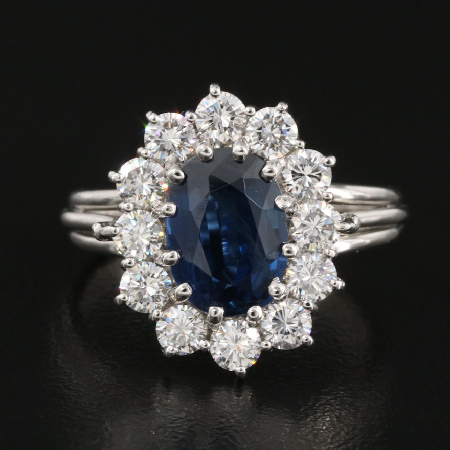 Platinum 3.46 CT Sapphire and 1.20 CTW Diamond Halo Ring