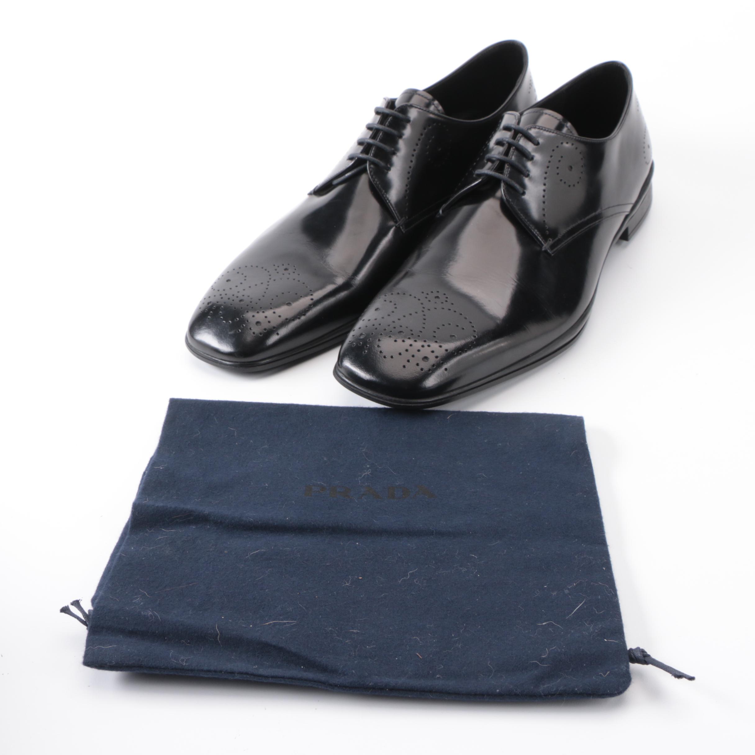 Prada Derbys in Perforated Black Spazzalato Leather with Rubber Soles