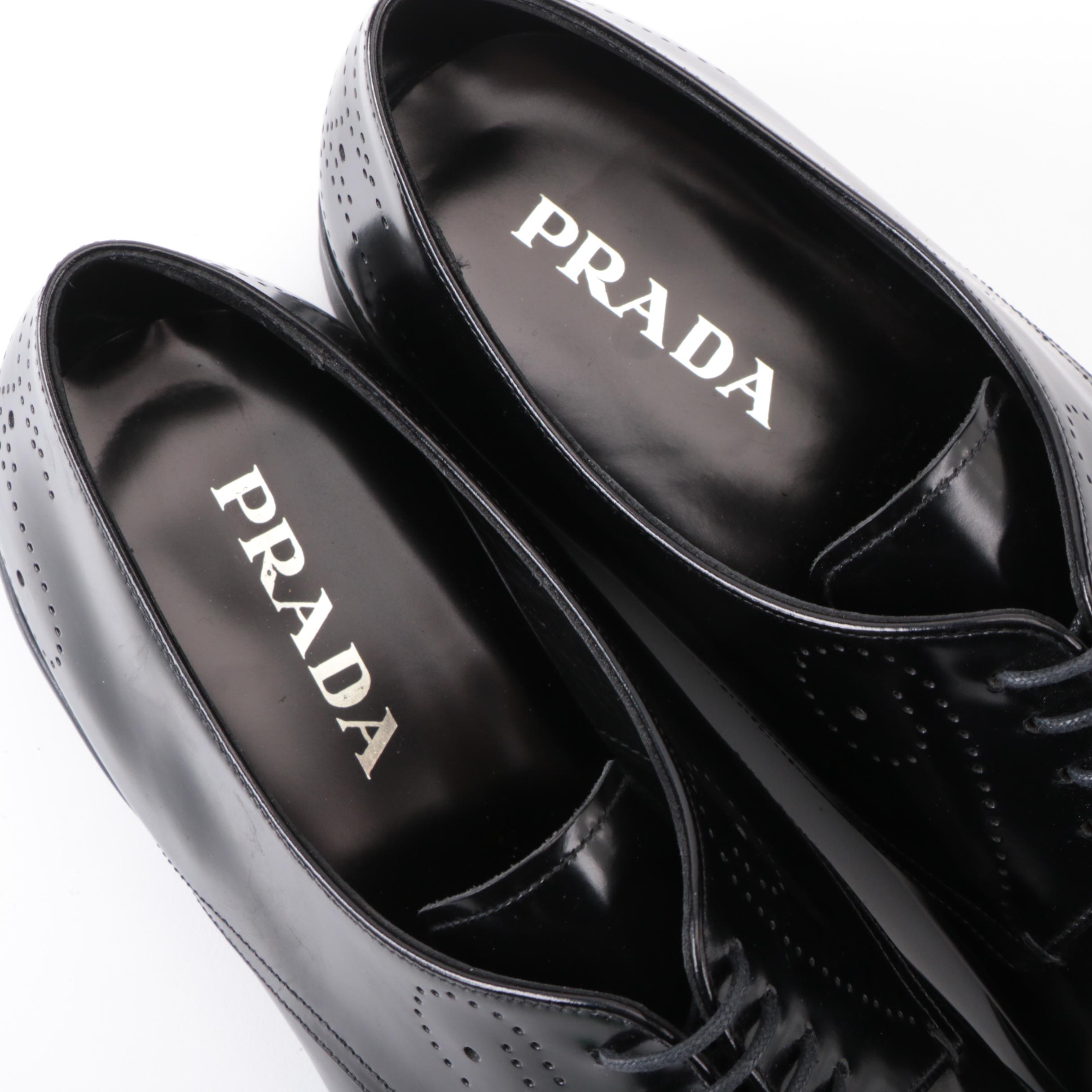 Prada Derbys in Perforated Black Spazzalato Leather with Rubber Soles