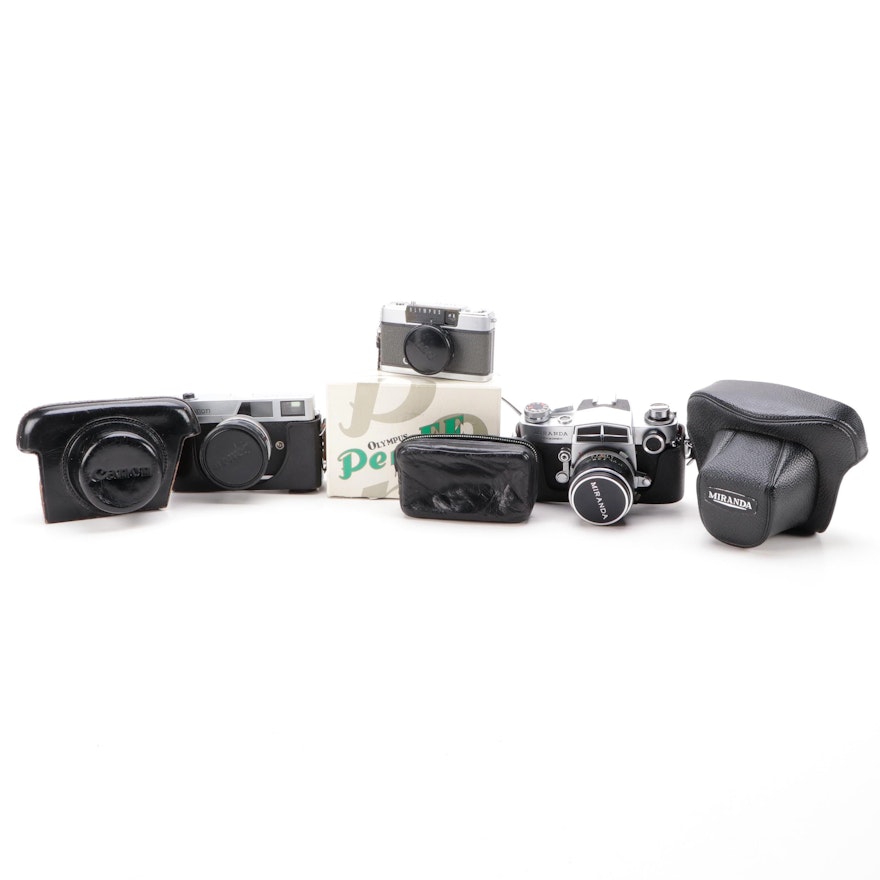 Olympus, Canon and Miranda SLR Cameras with Cases