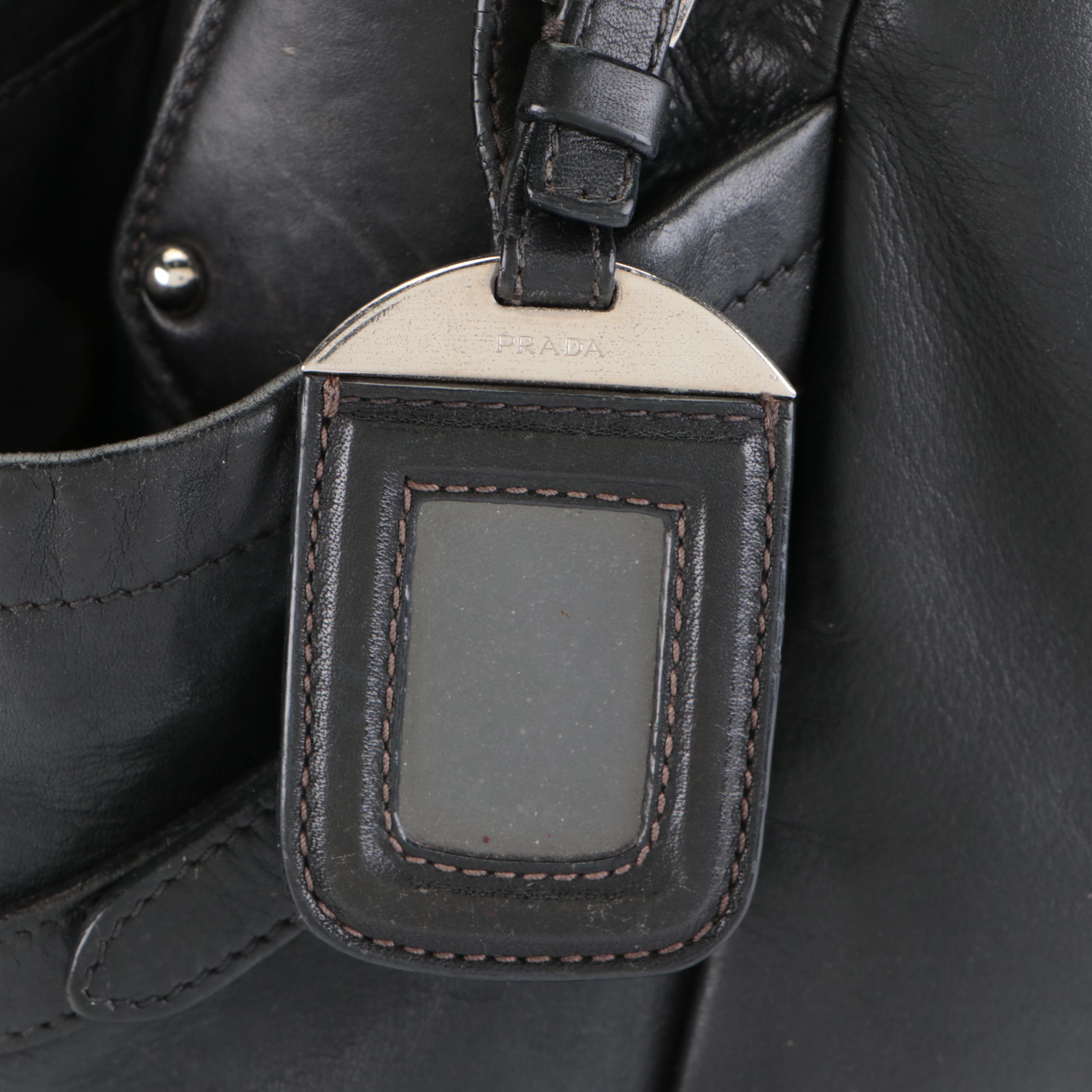 Prada Side Pocket Shoulder Bag with Buckle Strap Accents in Black Leather