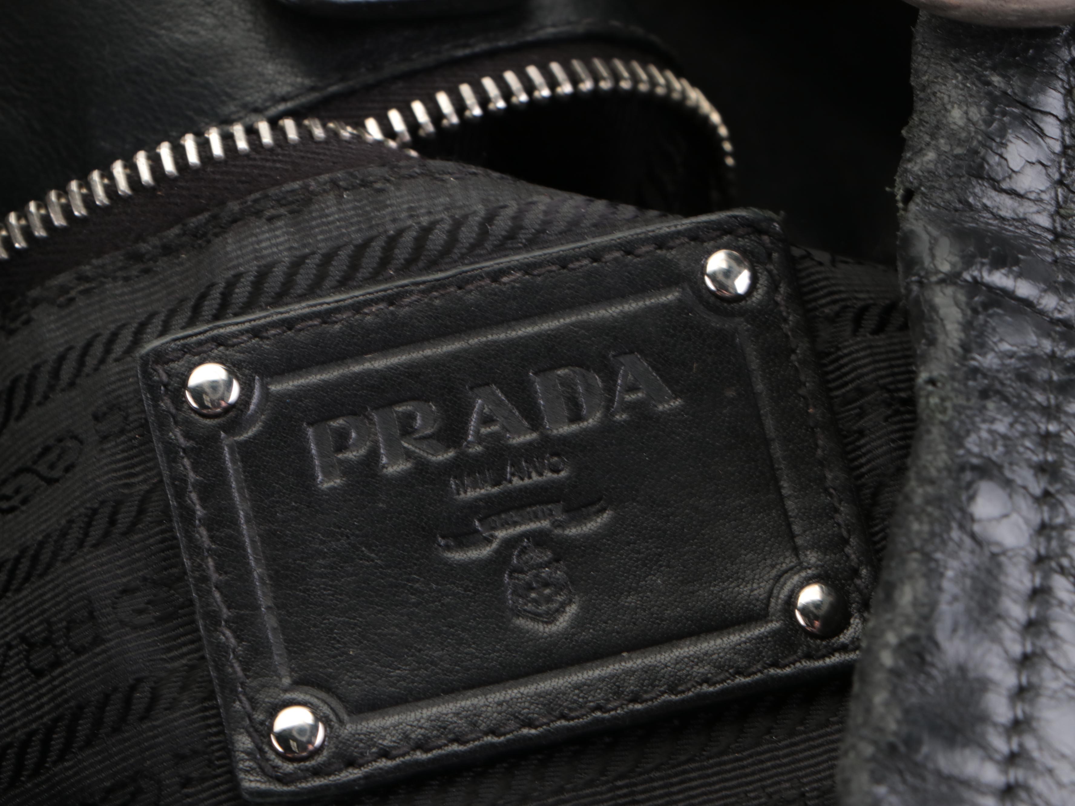 Prada Side Pocket Shoulder Bag with Buckle Strap Accents in Black Leather