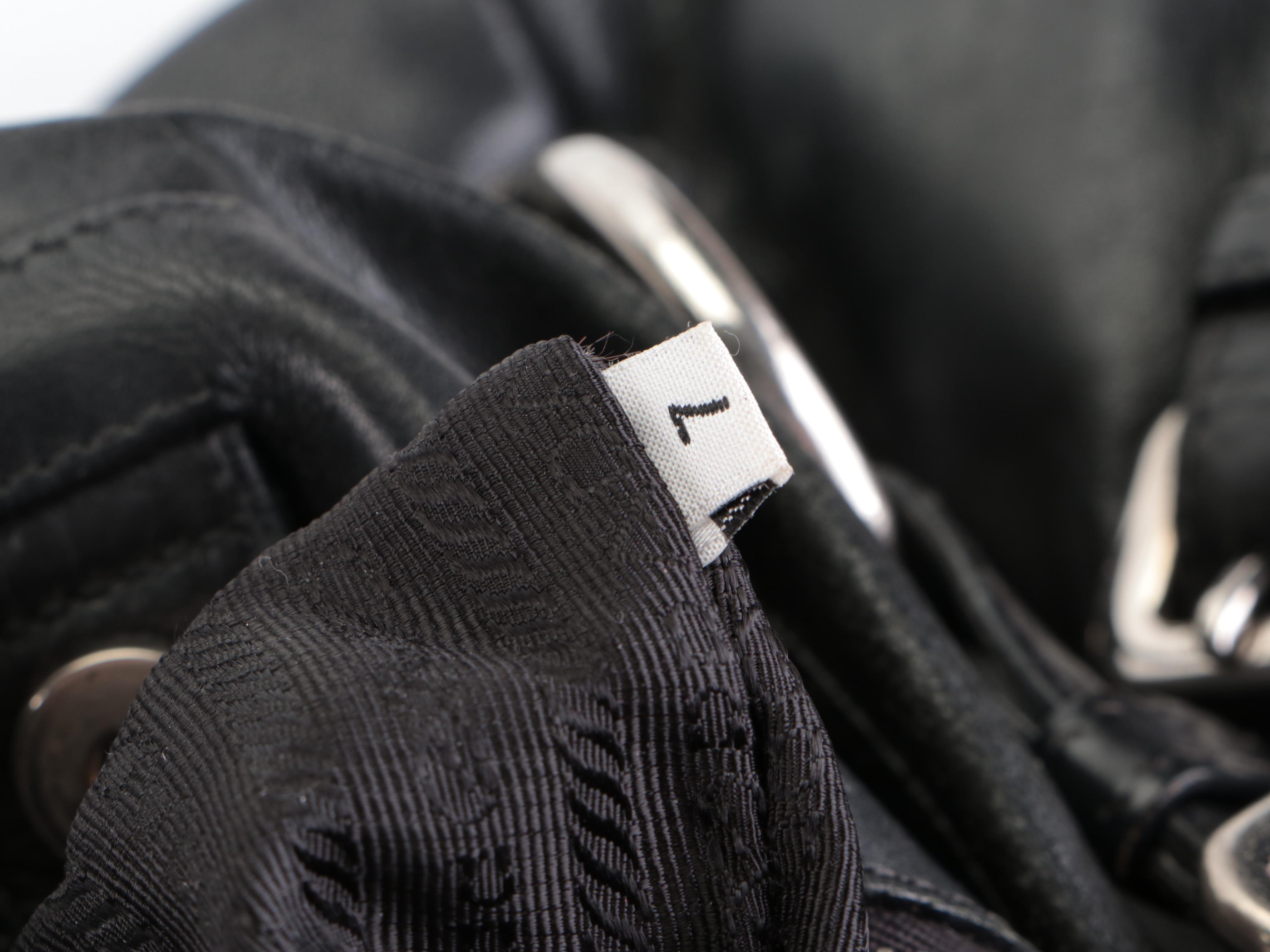 Prada Side Pocket Shoulder Bag with Buckle Strap Accents in Black Leather