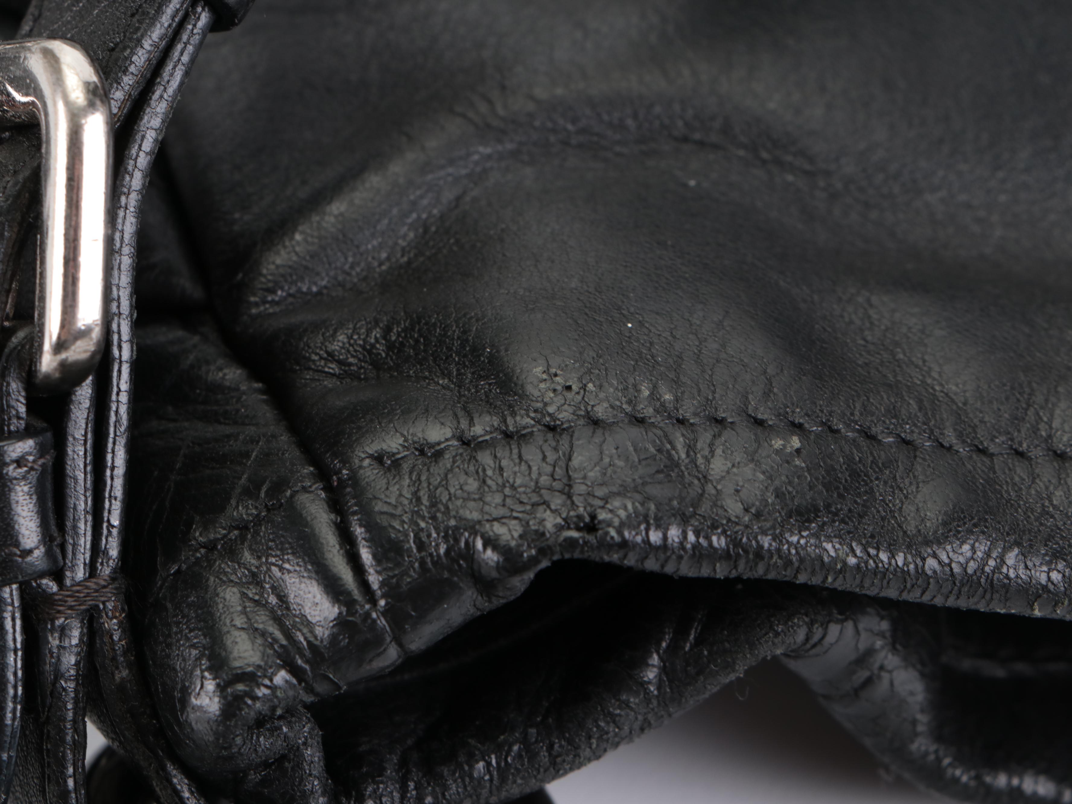 Prada Side Pocket Shoulder Bag with Buckle Strap Accents in Black Leather