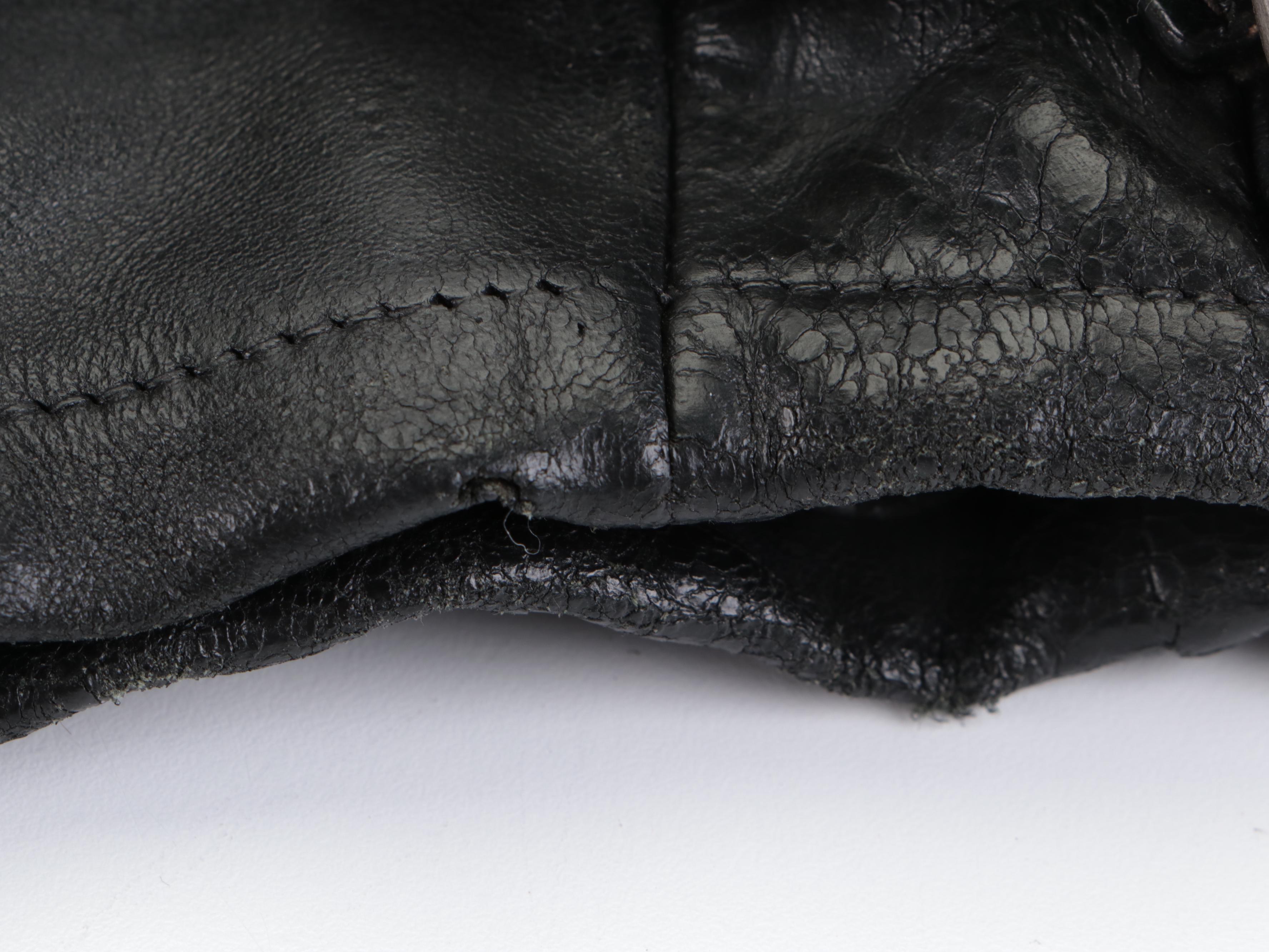 Prada Side Pocket Shoulder Bag with Buckle Strap Accents in Black Leather