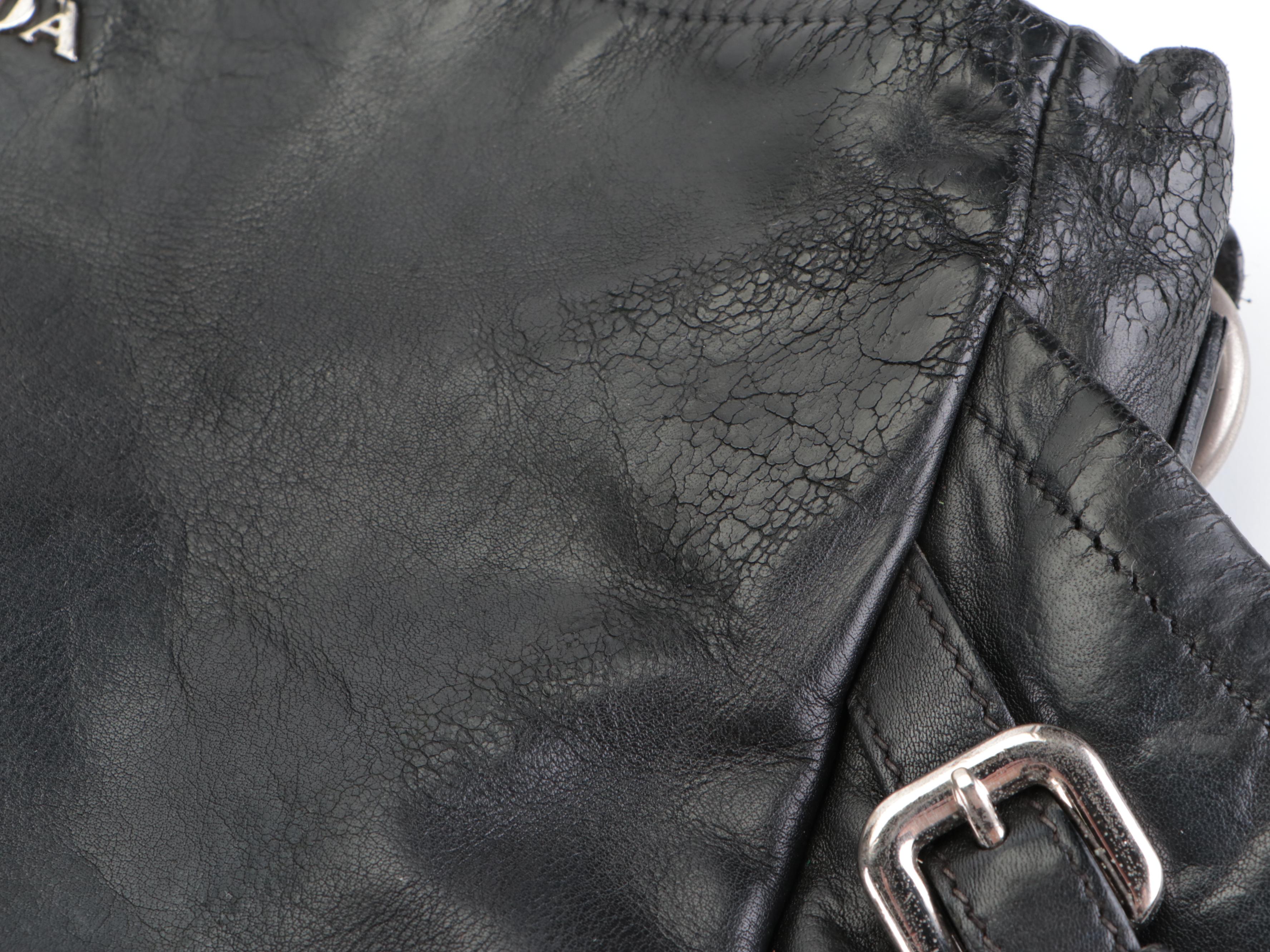 Prada Side Pocket Shoulder Bag with Buckle Strap Accents in Black Leather