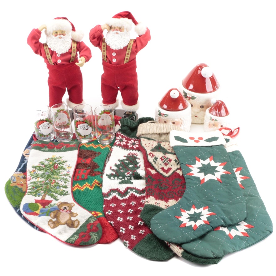 Dancing Santa Figures with Christmas Stockings, Canisters and Glasses