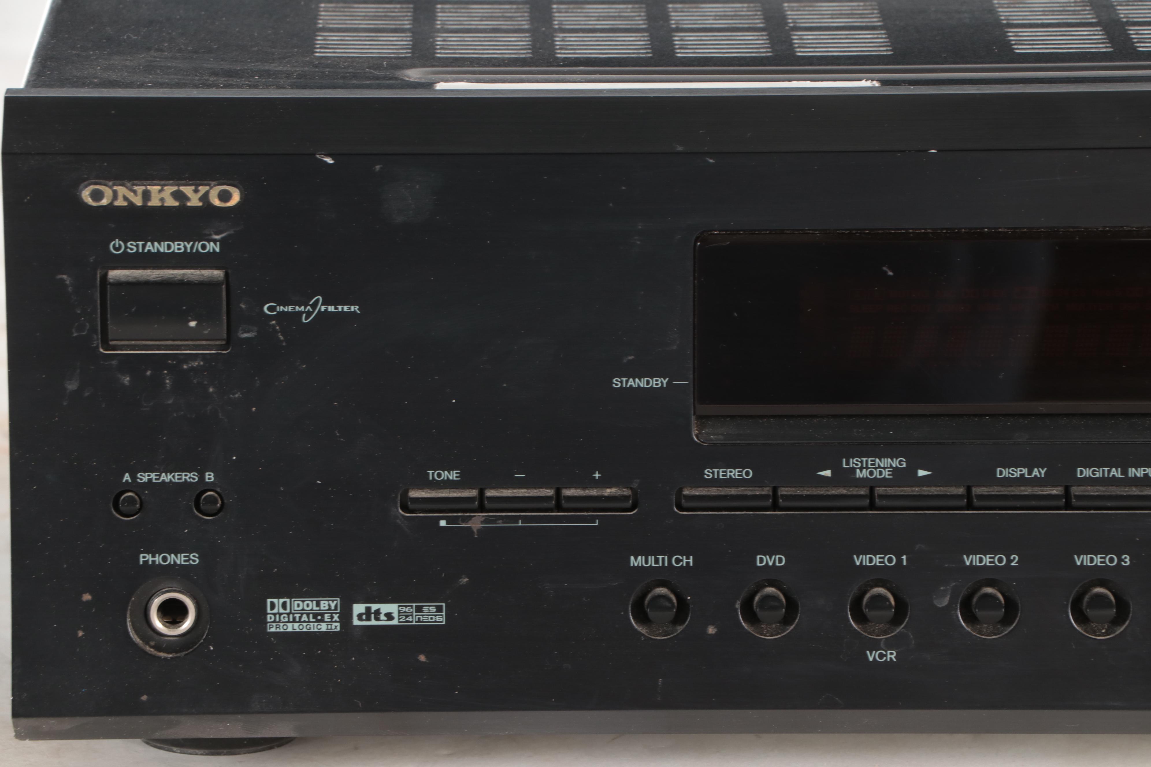 Onkyo AV Receiver and JL Audio Speaker in Cabinet, ca. 2004