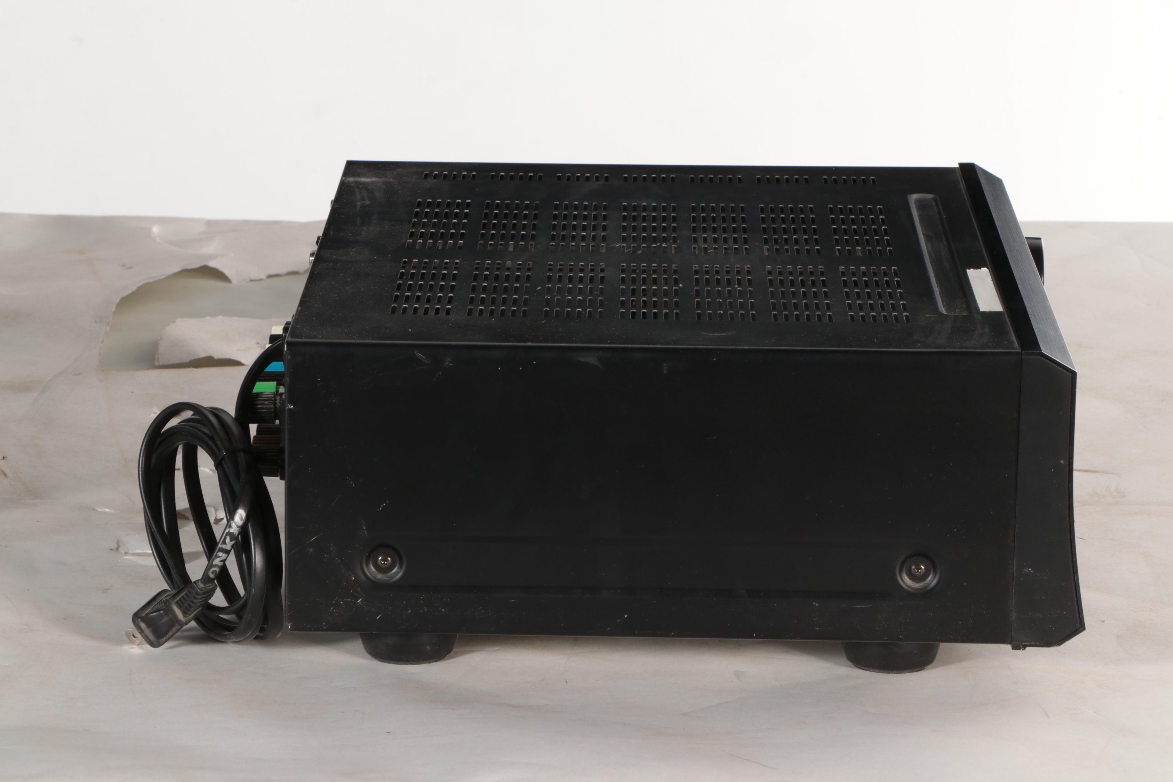 Onkyo AV Receiver and JL Audio Speaker in Cabinet, ca. 2004