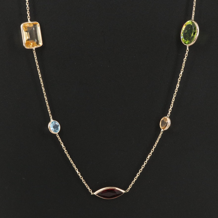 14K Gemstone Station Necklace Including Garnet, Peridot and Sky Blue Topaz