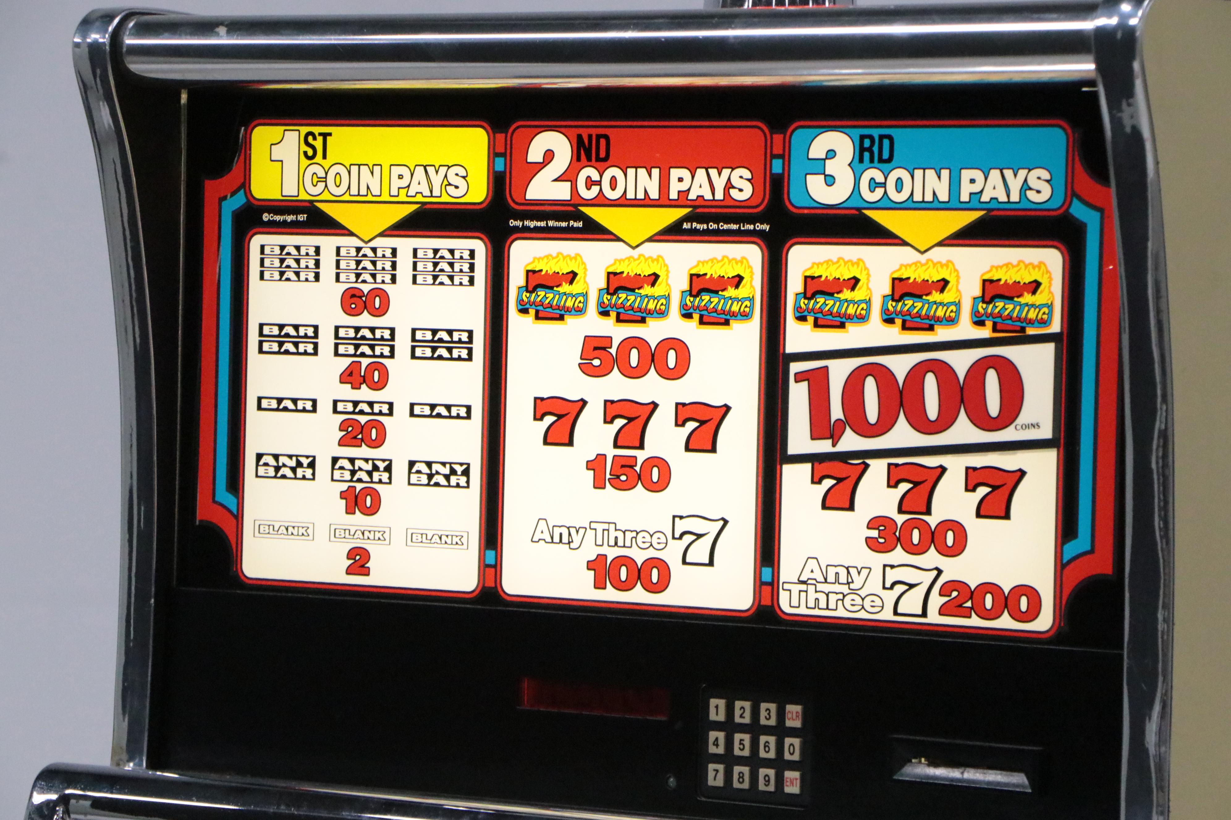 "Sizzling 7" Electric Token Operated Novelty Slot Machine with Base and Chair