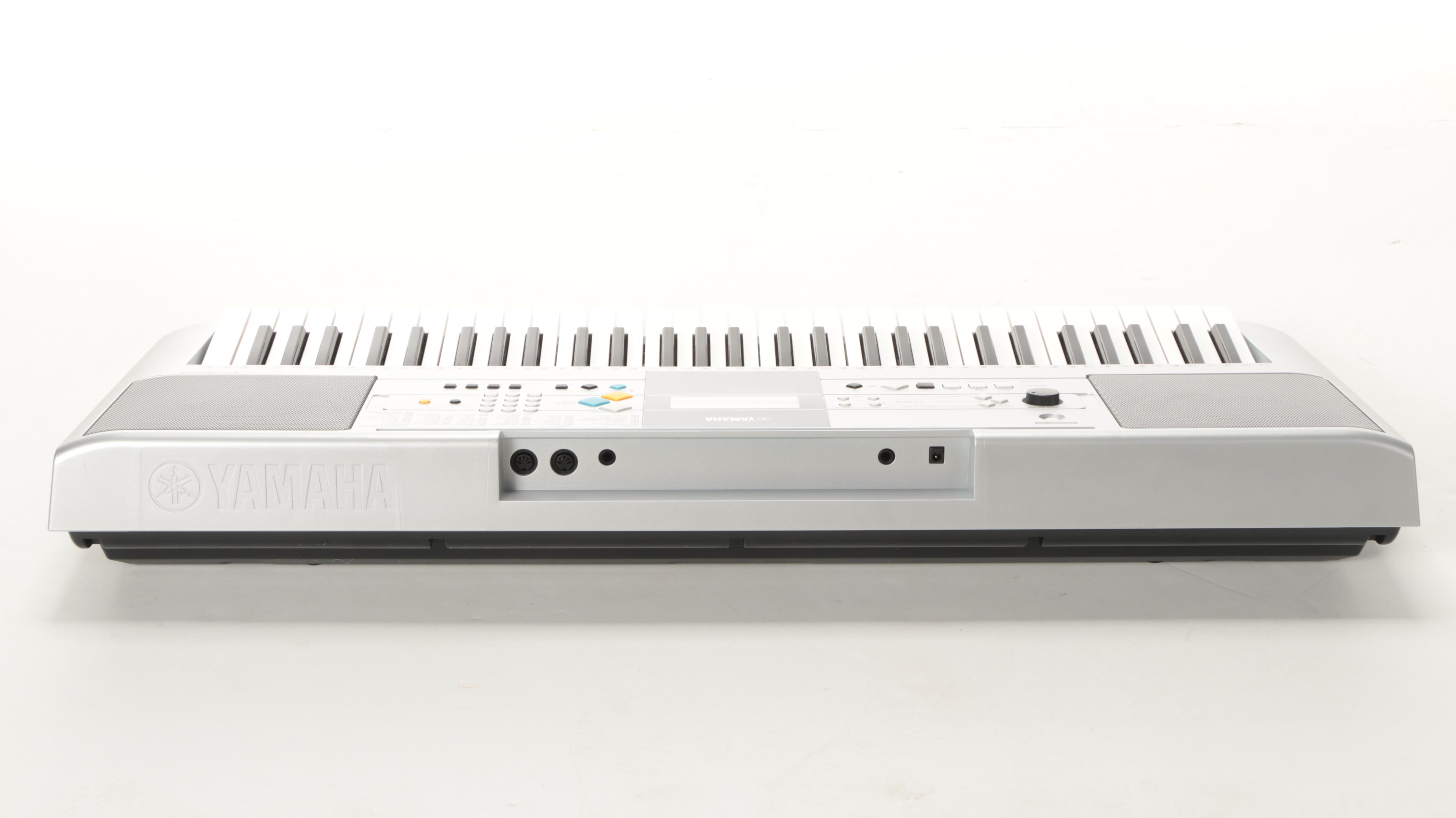 Yamaha PSR-E323 Digital Keyboard with Manual, Headphones and Foot Pedal