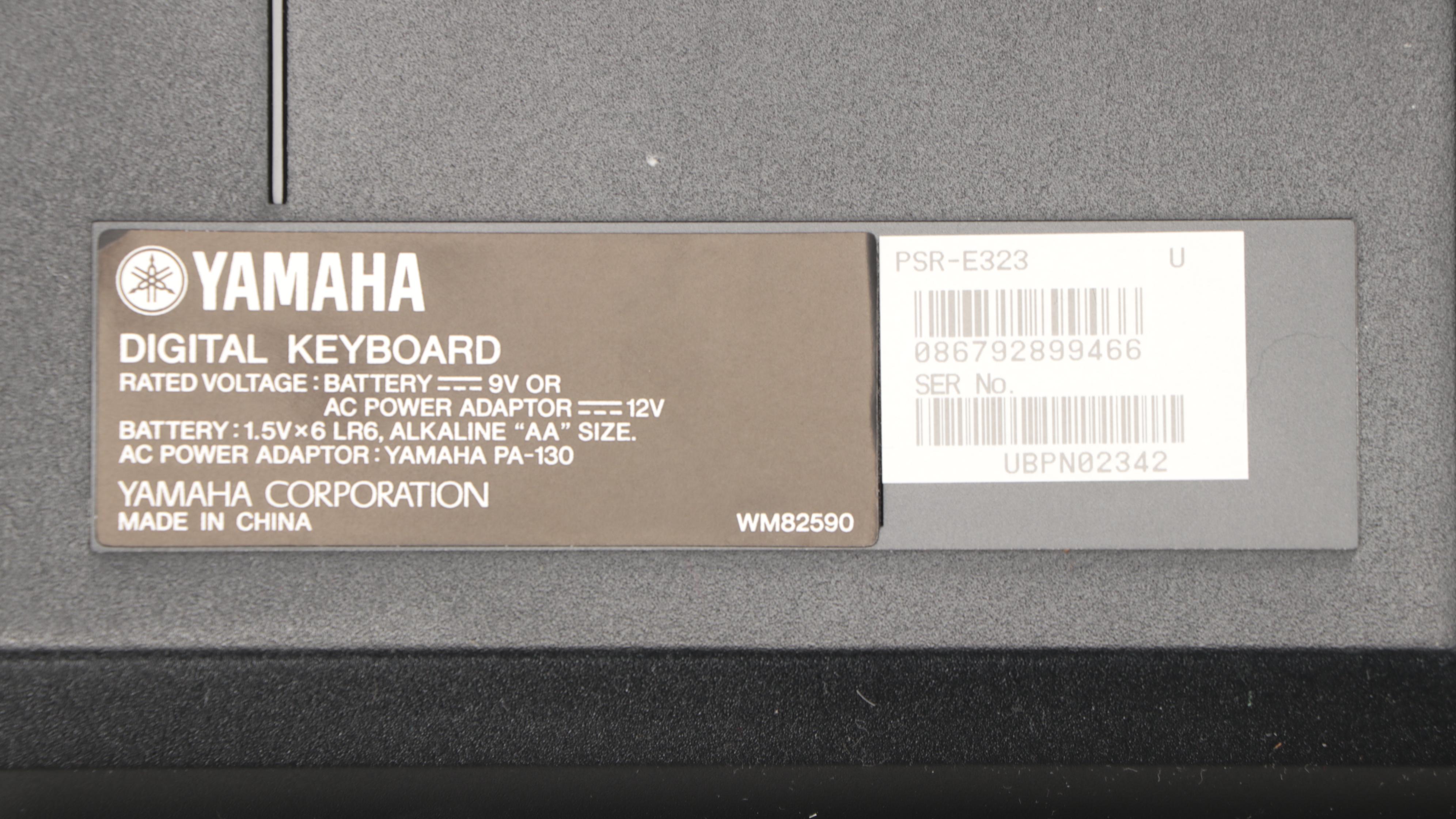 Yamaha PSR-E323 Digital Keyboard with Manual, Headphones and Foot Pedal