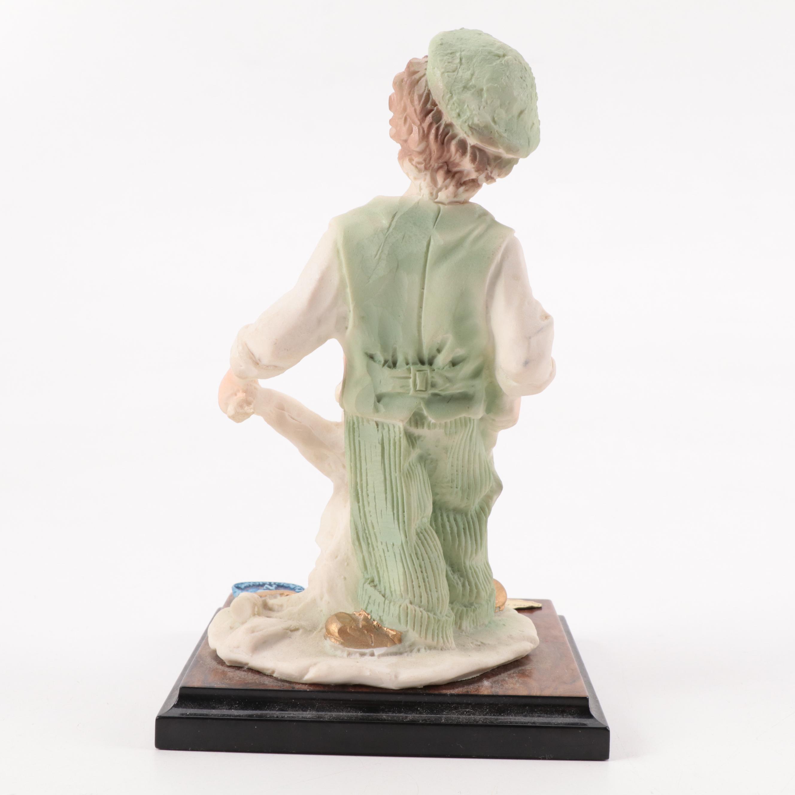 Capodimonte Boy with Axe Resin Figurine, Late 20th Century