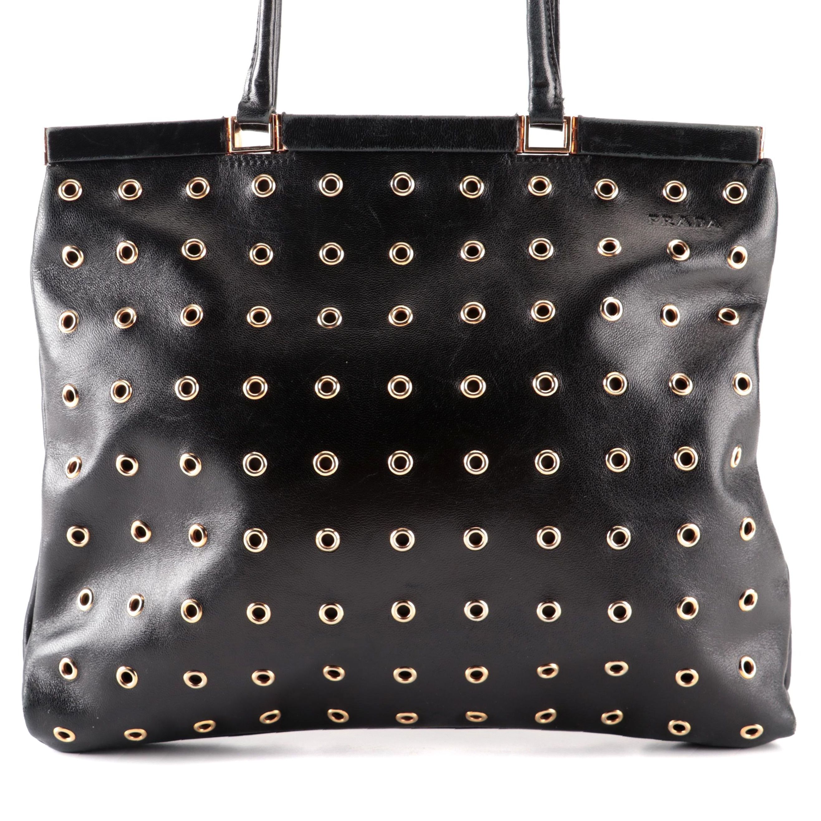 Prada Hinged Flat Shoulder Bag in Black Lambskin with Grommet Detail