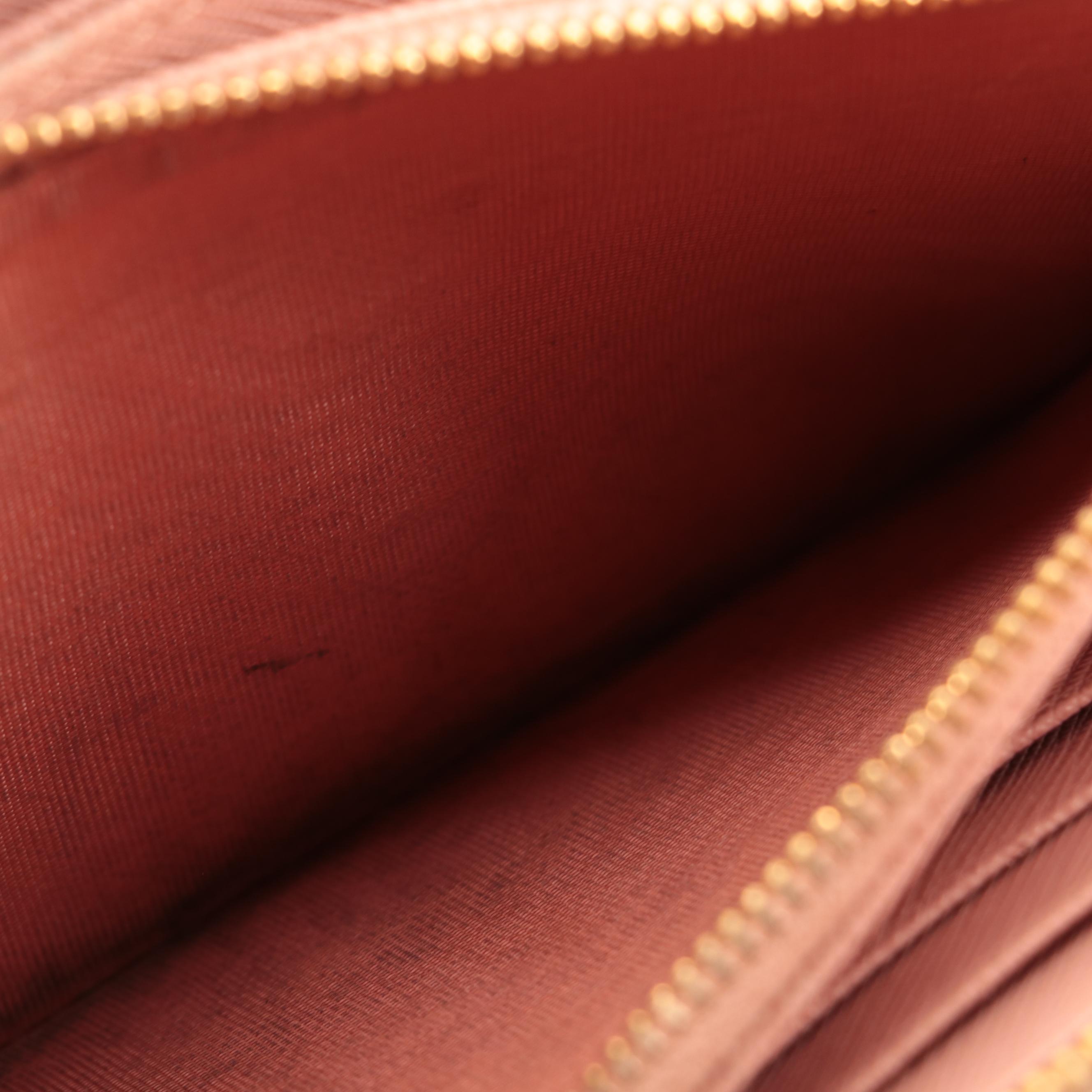 Prada Zip-Around Wallet with Bow in Pink Saffiano Leather