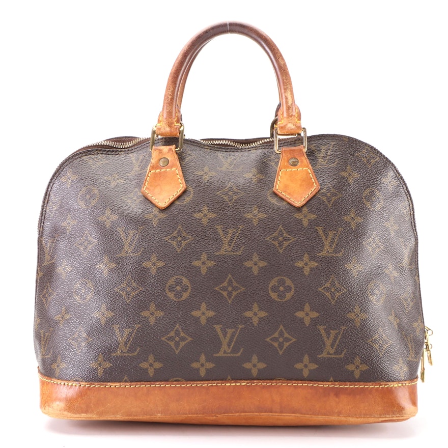 Louis Vuitton Alma Handbag PM in Monogram Canvas and Vachetta Leather