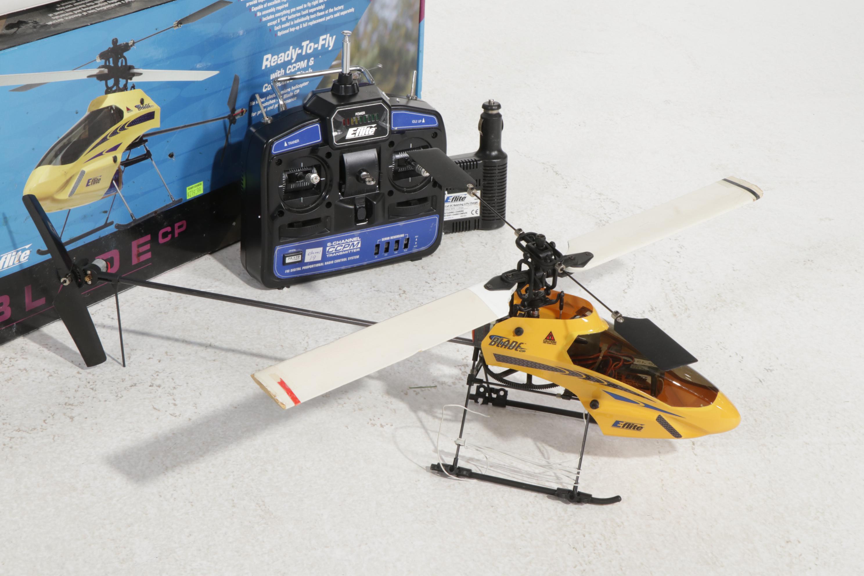 Two E-Flite Blade MCX and Blade CP RC Helicopters and Estes Rocket Race Set