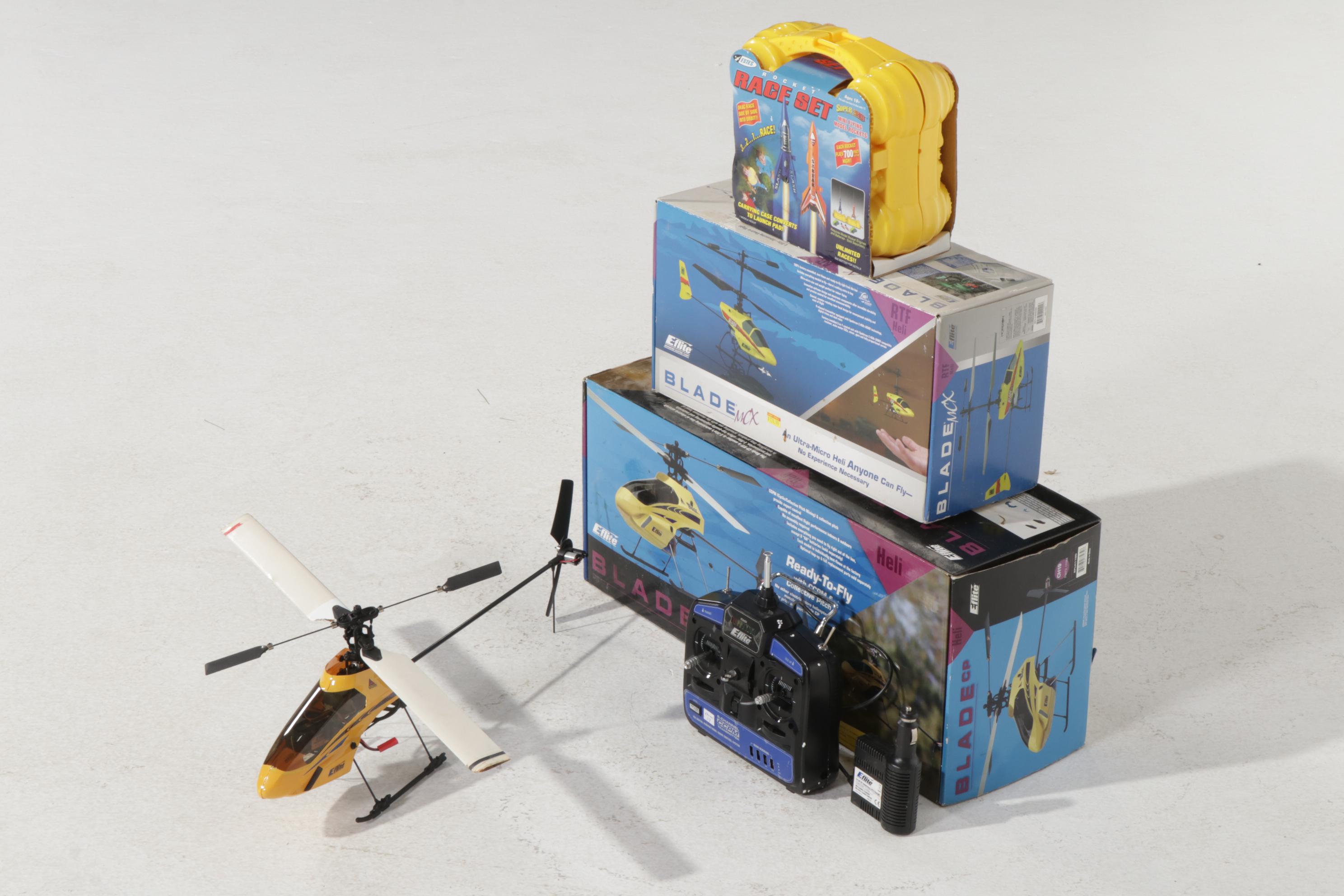 Two E-Flite Blade MCX and Blade CP RC Helicopters and Estes Rocket Race Set