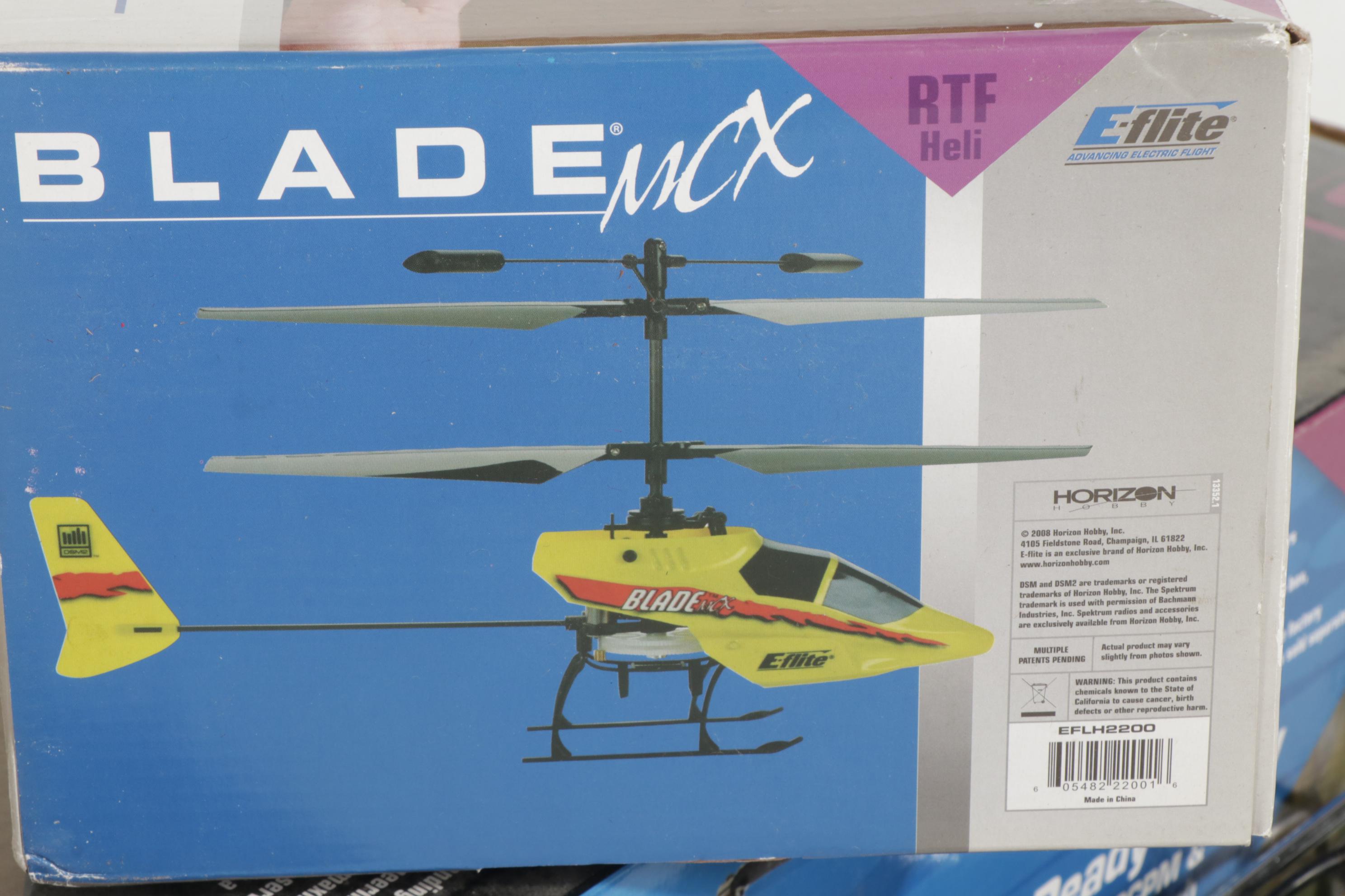 Two E-Flite Blade MCX and Blade CP RC Helicopters and Estes Rocket Race Set