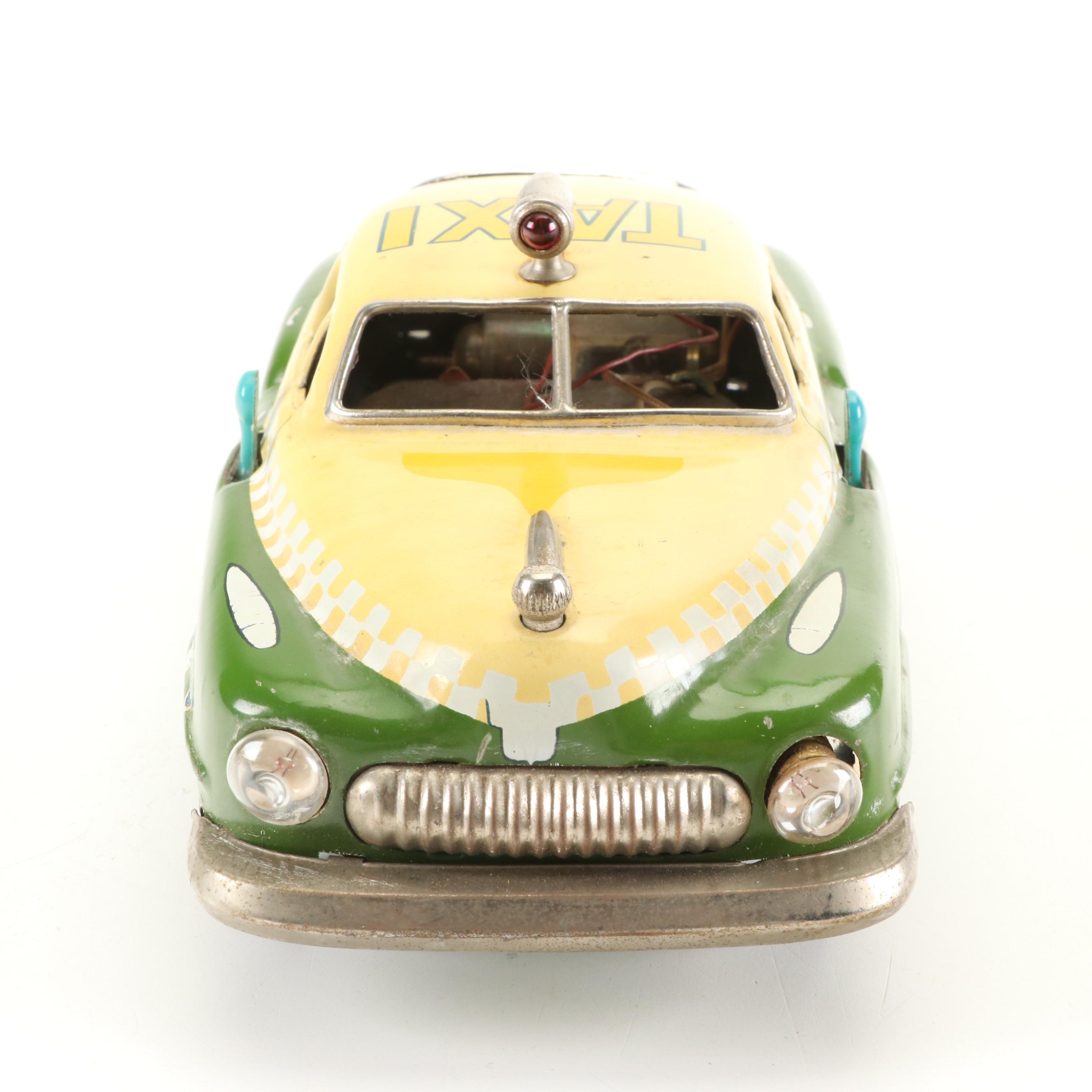 Mizuno Electromobile Tin Lithograph Battery Operated Taxi with Friction Cabs